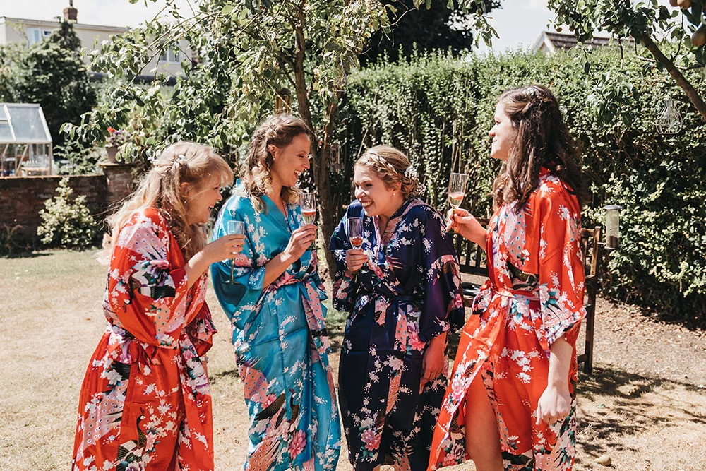 Tips for Brides 6 Bridesmaids laughing over breakfast
