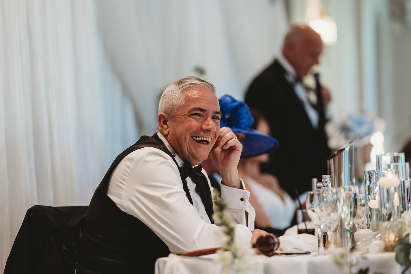 Wedding guests reacting during the speeches at The Orangery Maidstone