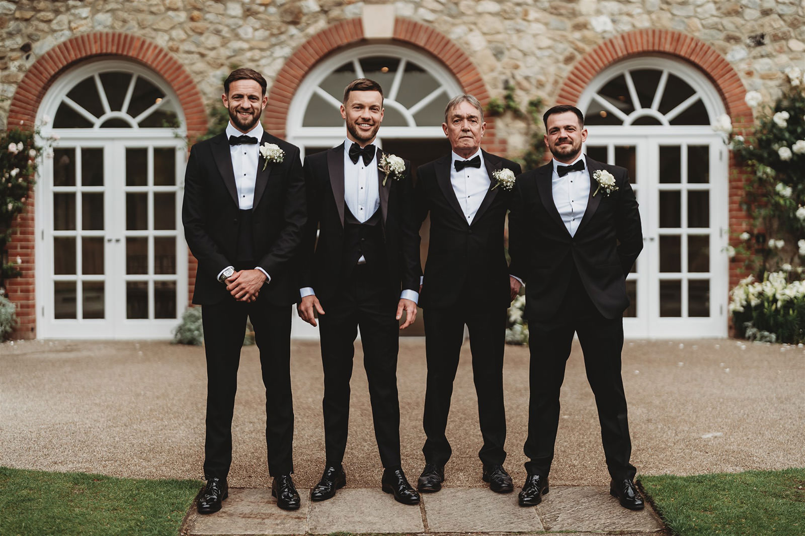 Groomsmen outside the Orangery building at Maidstone before the ceremony