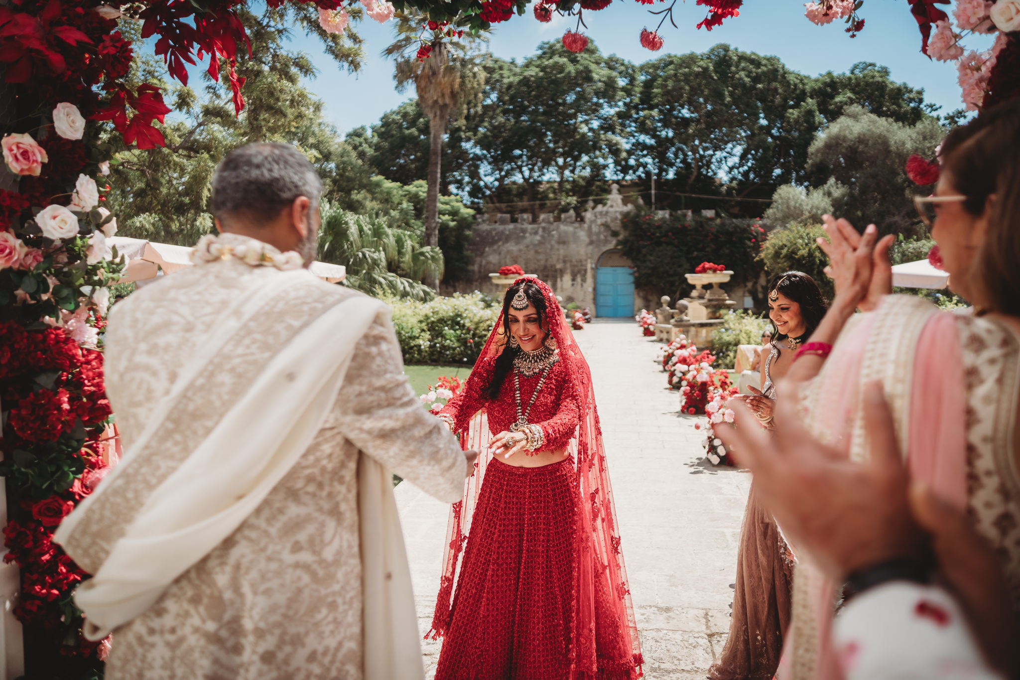 Lakshna & Neil / Villa Bologna Wedding 28 Couple and guests in the gardens of Villa Bologna after the ceremony