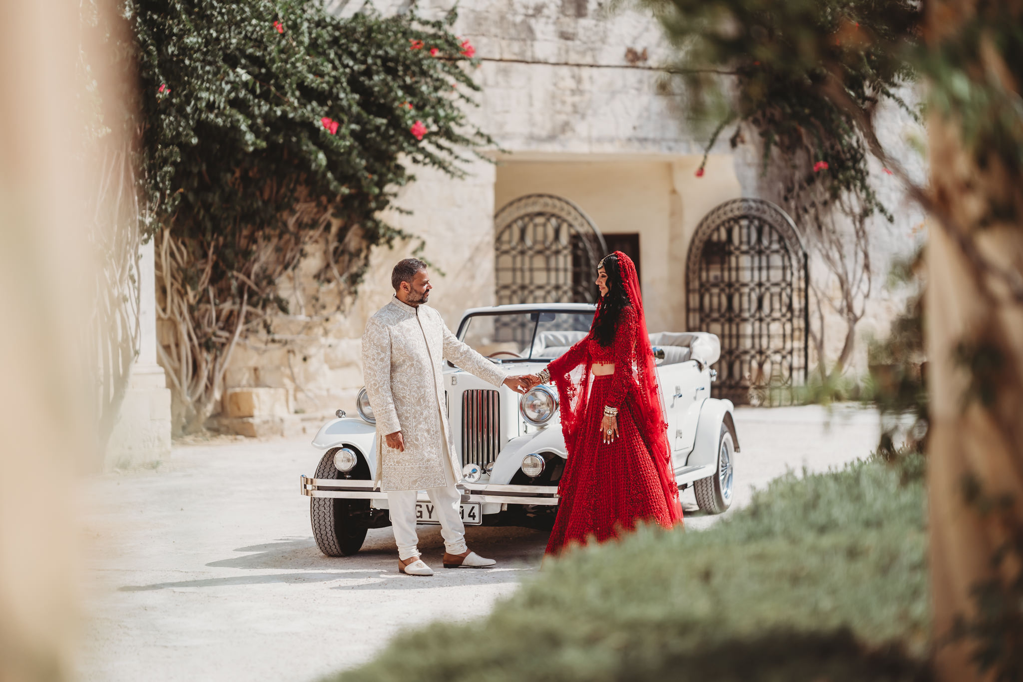 Lakshna & Neil / Villa Bologna Wedding 42 Couple and guests in the gardens of Villa Bologna after the ceremony