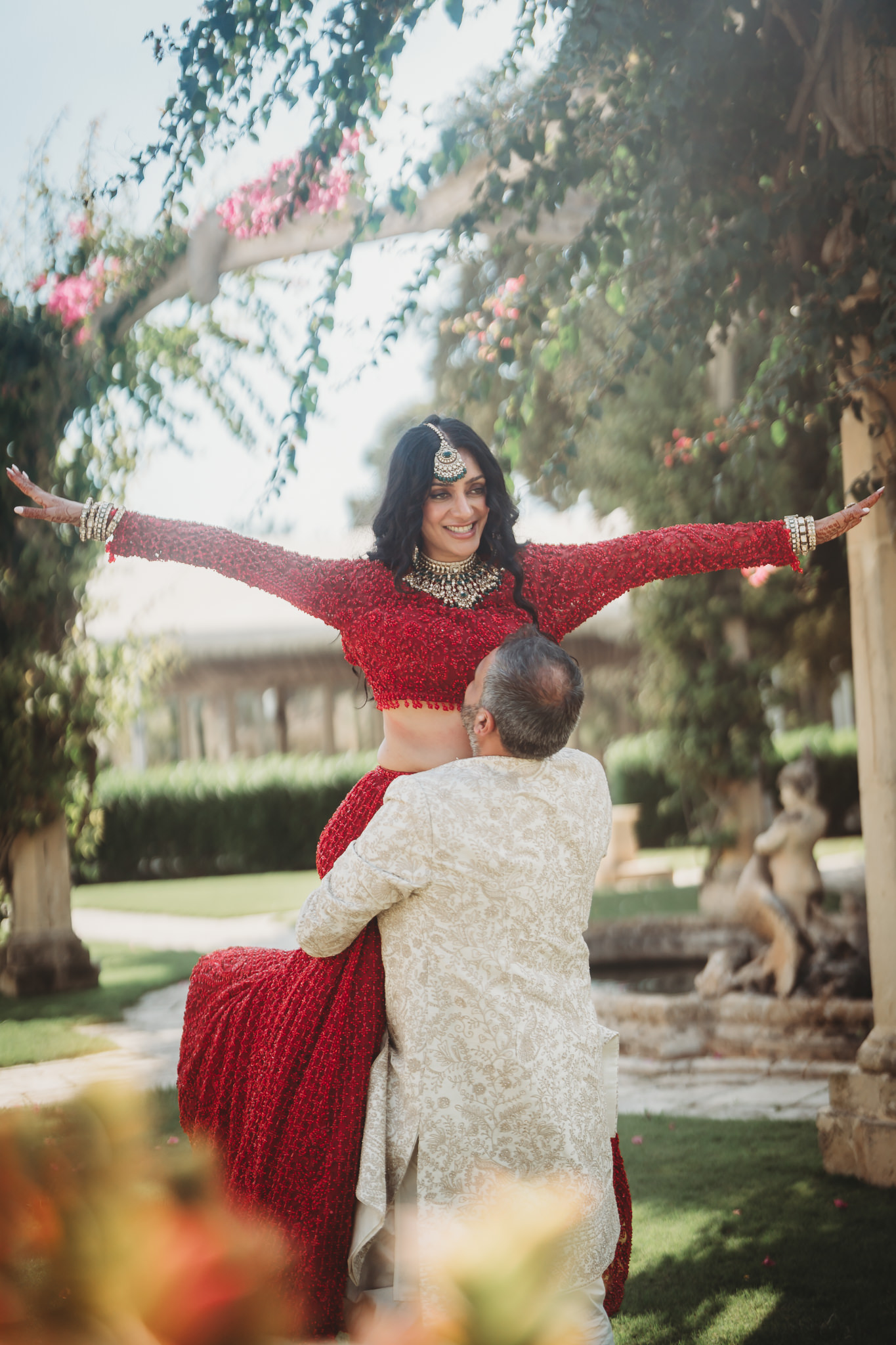 Lakshna & Neil / Villa Bologna Wedding 43 Couple and guests in the gardens of Villa Bologna after the ceremony