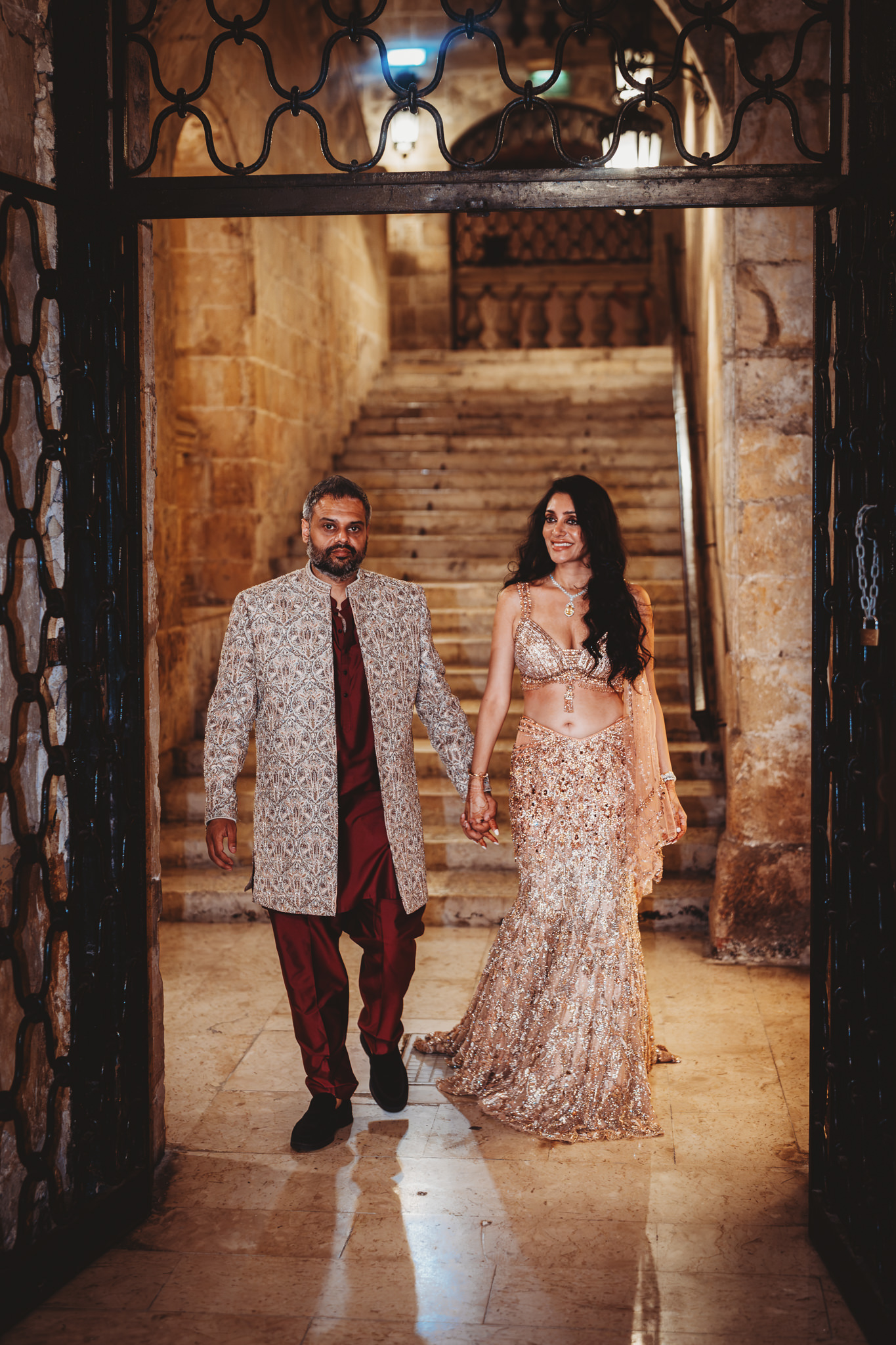 Lakshna & Neil / Villa Bologna Wedding 57 Bride in red lehenga at Villa Bologna wedding, Malta