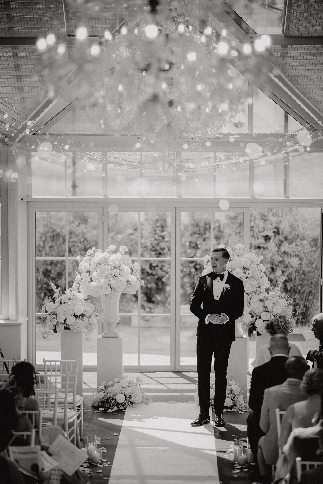 Wedding ceremony in the glasshouse at Botleys Mansion, Chertsey