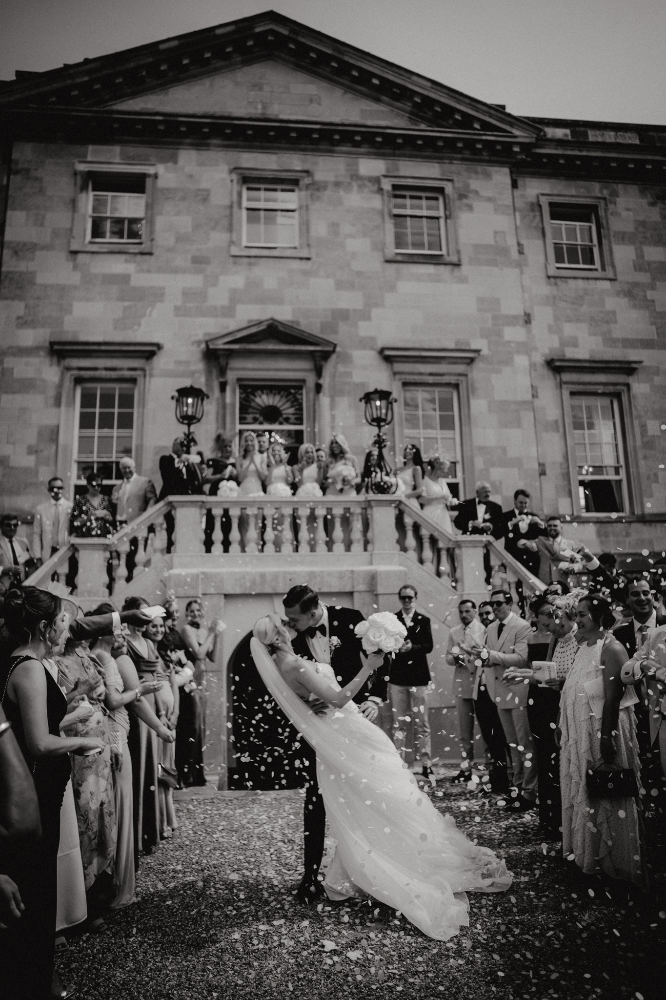 Confetti on the grand staircase at a Botleys Mansion wedding