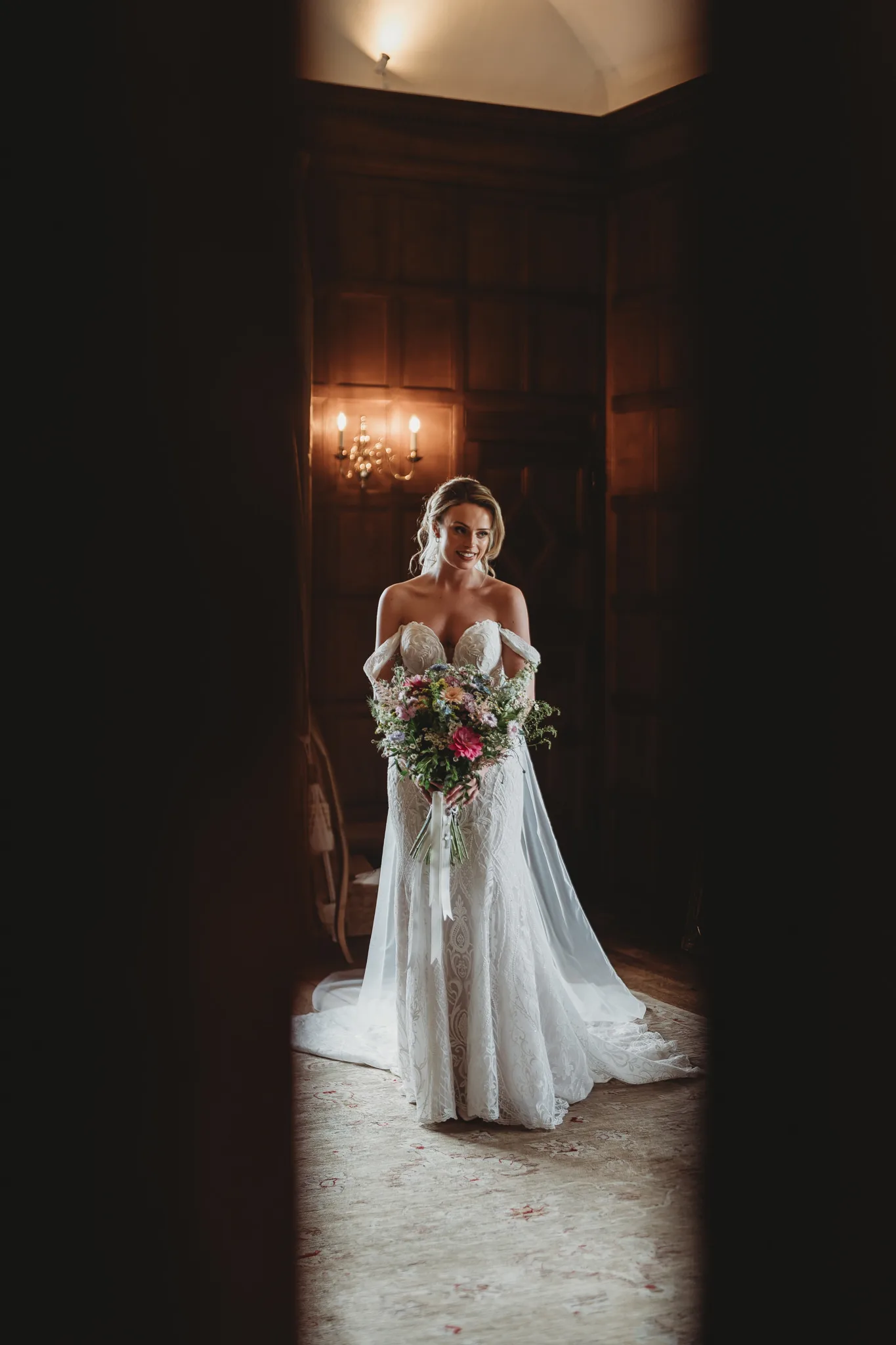 documentary wedding photography — bride ready, seen through the doorway