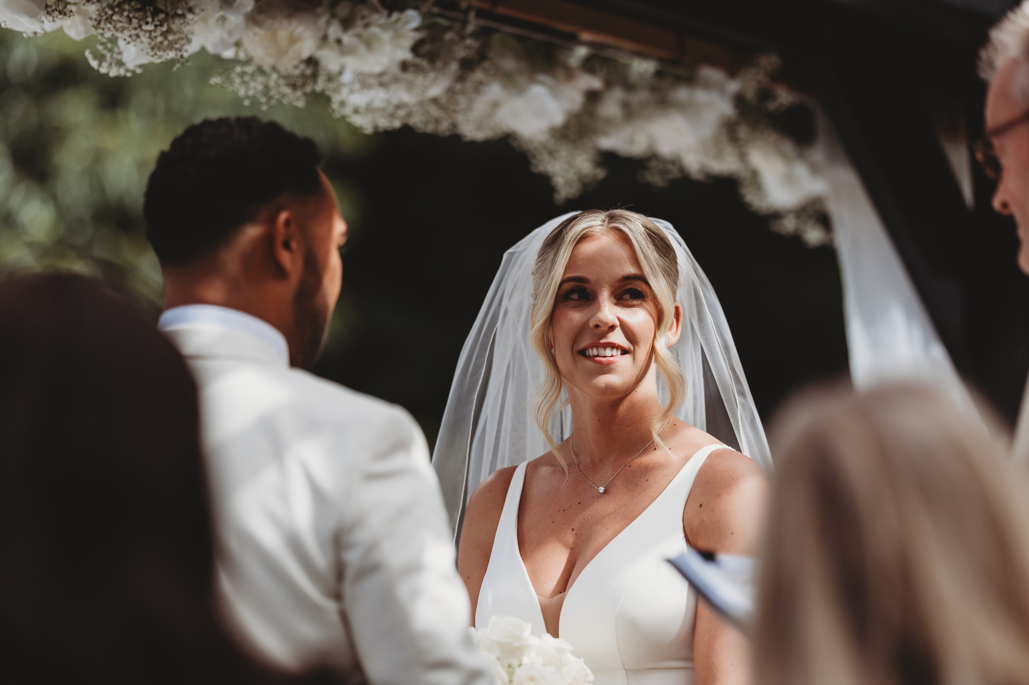 Millie & Ashley / Swynford Manor 58 Outdoor wedding ceremony at Swynford Manor — white floral arch