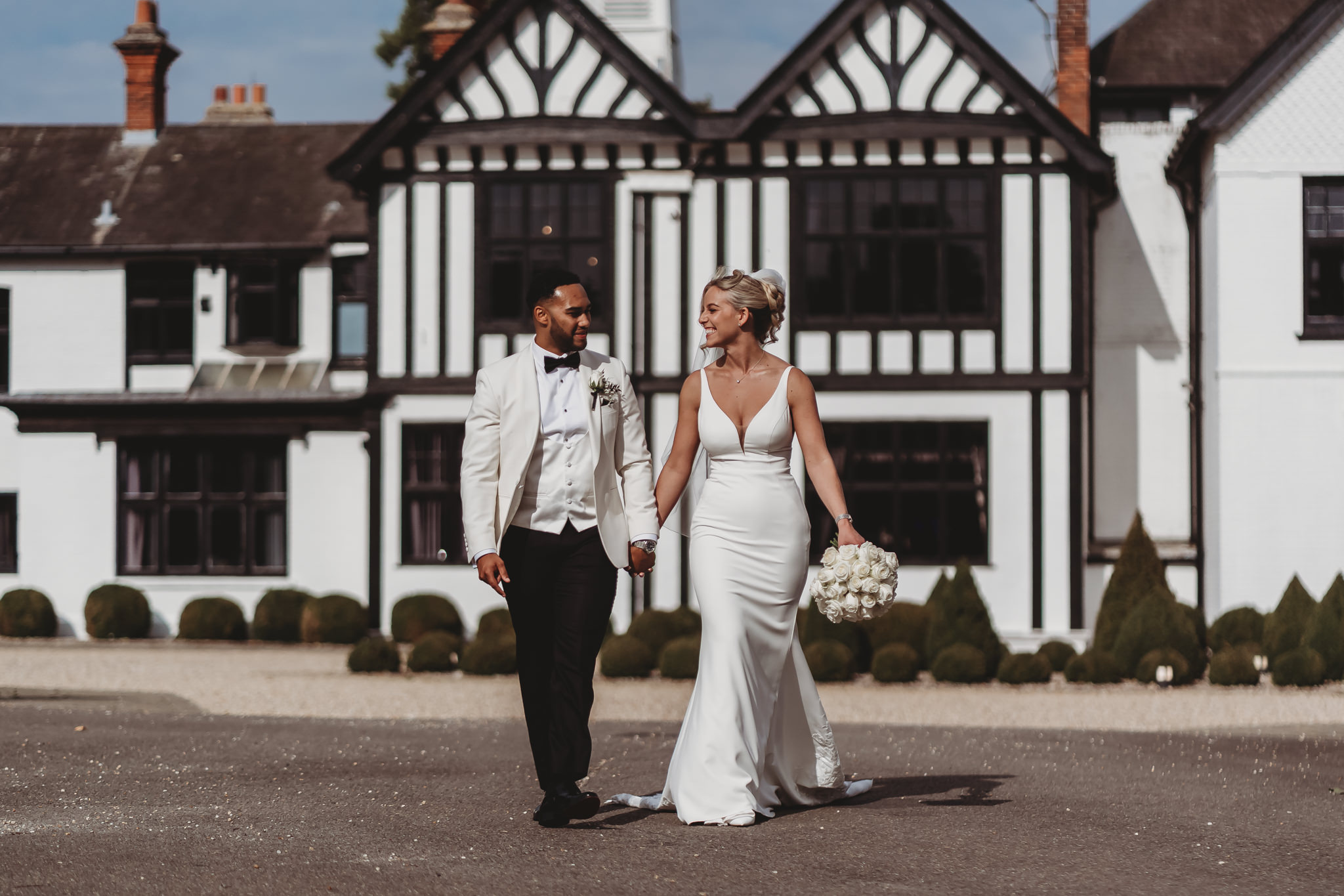 Millie & Ashley / Swynford Manor 80 Bride and groom in the grounds at a Swynford Manor wedding — Cambridgeshire wedding photographer