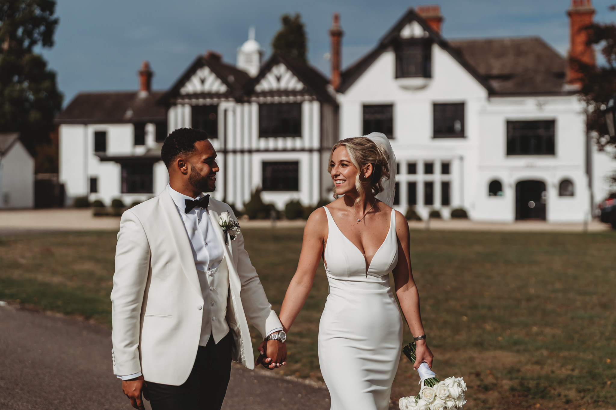 Millie & Ashley / Swynford Manor 81 Bride and groom in the grounds at a Swynford Manor wedding — Cambridgeshire wedding photographer