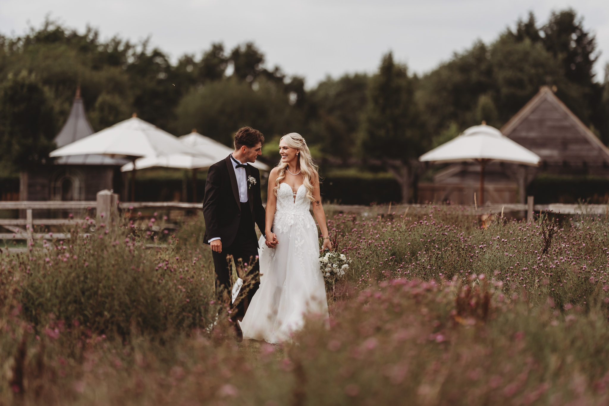 Ella & Ryan / Rackleys Barn 19 Bride and groom in the wildflower meadow at a Rackleys Barn wedding