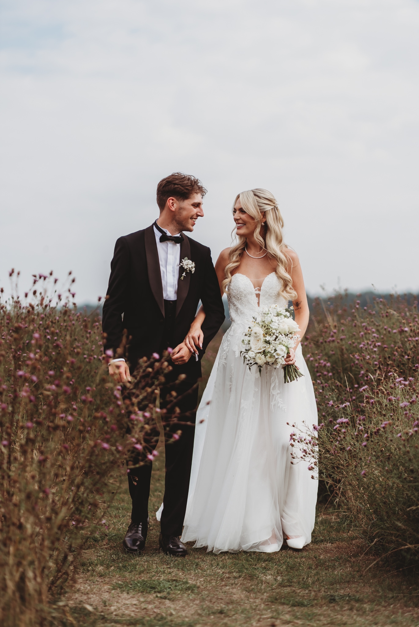 Ella & Ryan / Rackleys Barn 31 Bride and groom in the wildflower meadow at a Rackleys Barn wedding