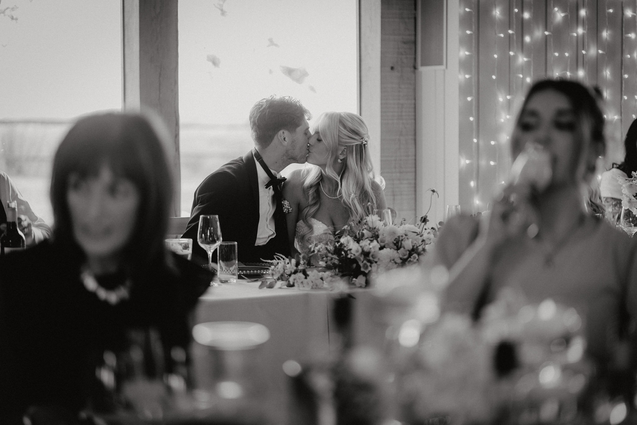 Ella & Ryan / Rackleys Barn 34 Wedding speeches under festoon lights at Rackleys Barn — Buckinghamshire wedding photographer