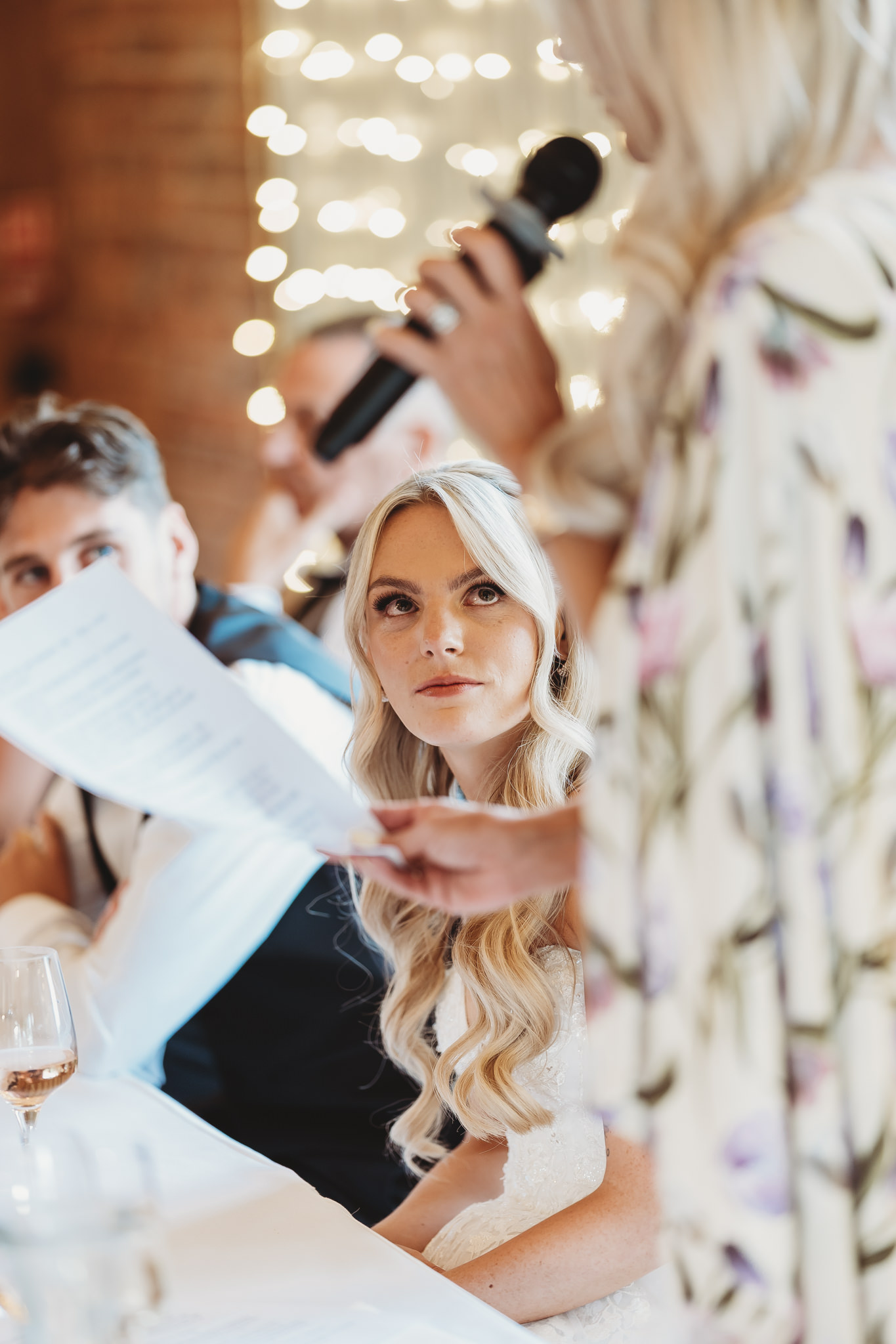 Ella & Ryan / Rackleys Barn 36 Wedding speeches under festoon lights at Rackleys Barn — Buckinghamshire wedding photographer