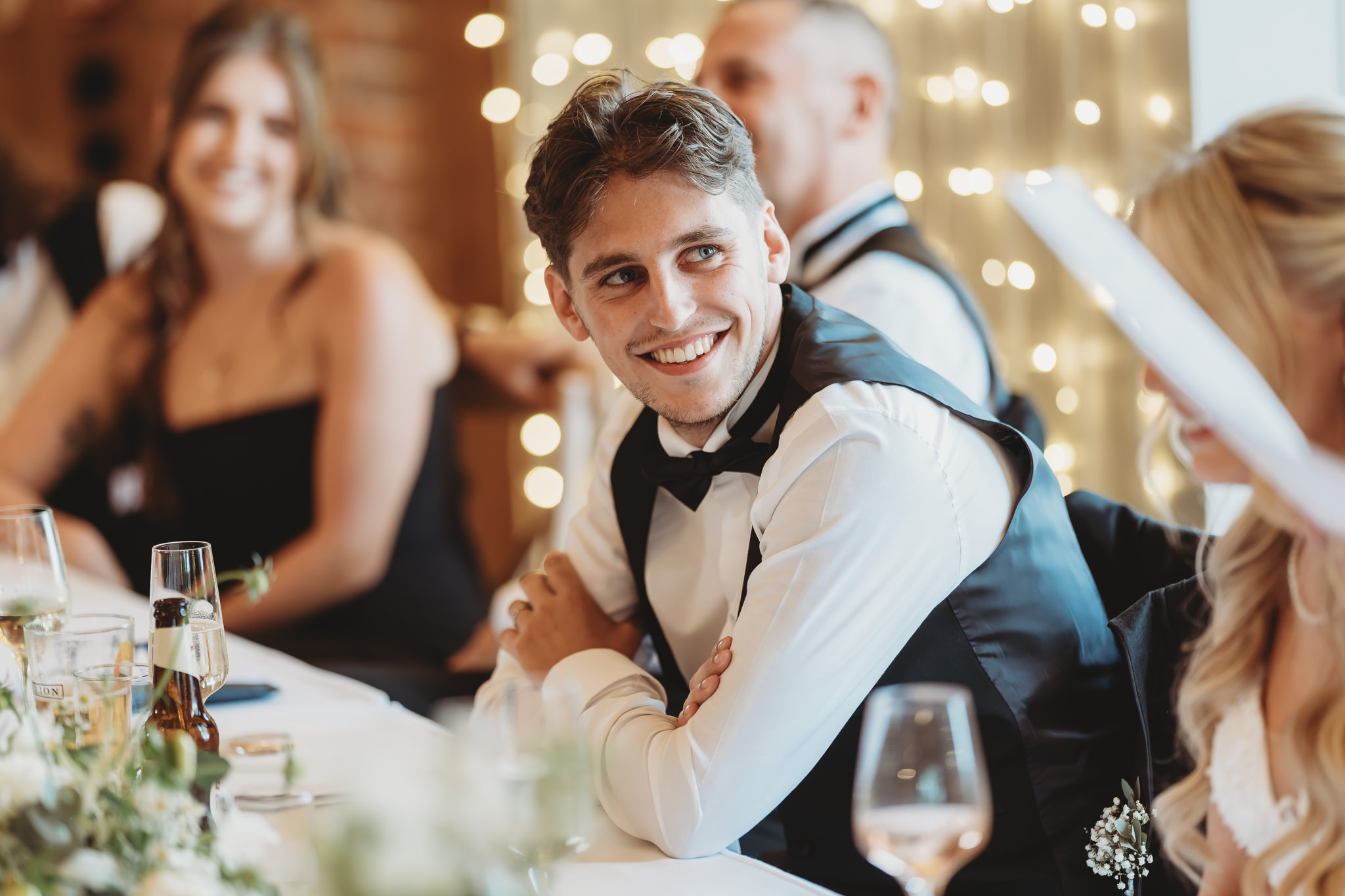 Ella & Ryan / Rackleys Barn 38 Wedding speeches under festoon lights at Rackleys Barn — Buckinghamshire wedding photographer