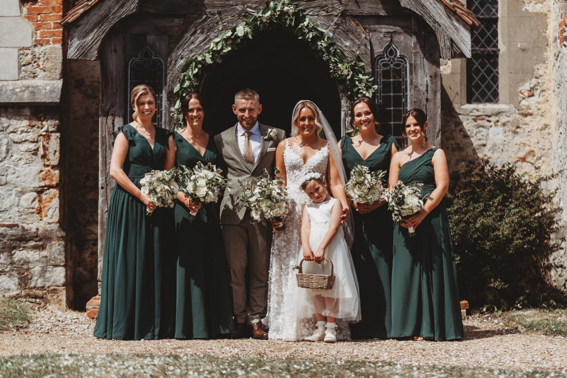 Bride and bridesmaids outside the church