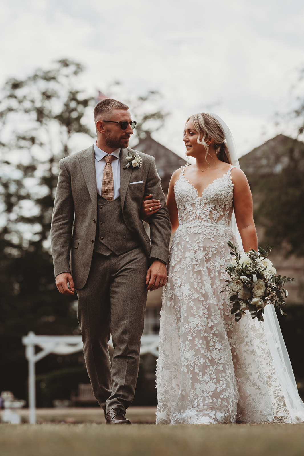 Sarah and Daniel walking together at Barnston Lodge