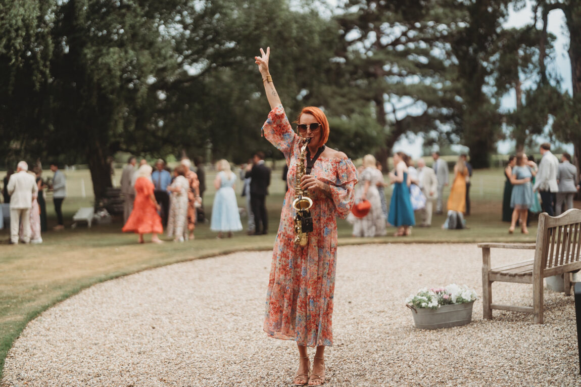 Guest cheering on the lawn at Barnston Lodge