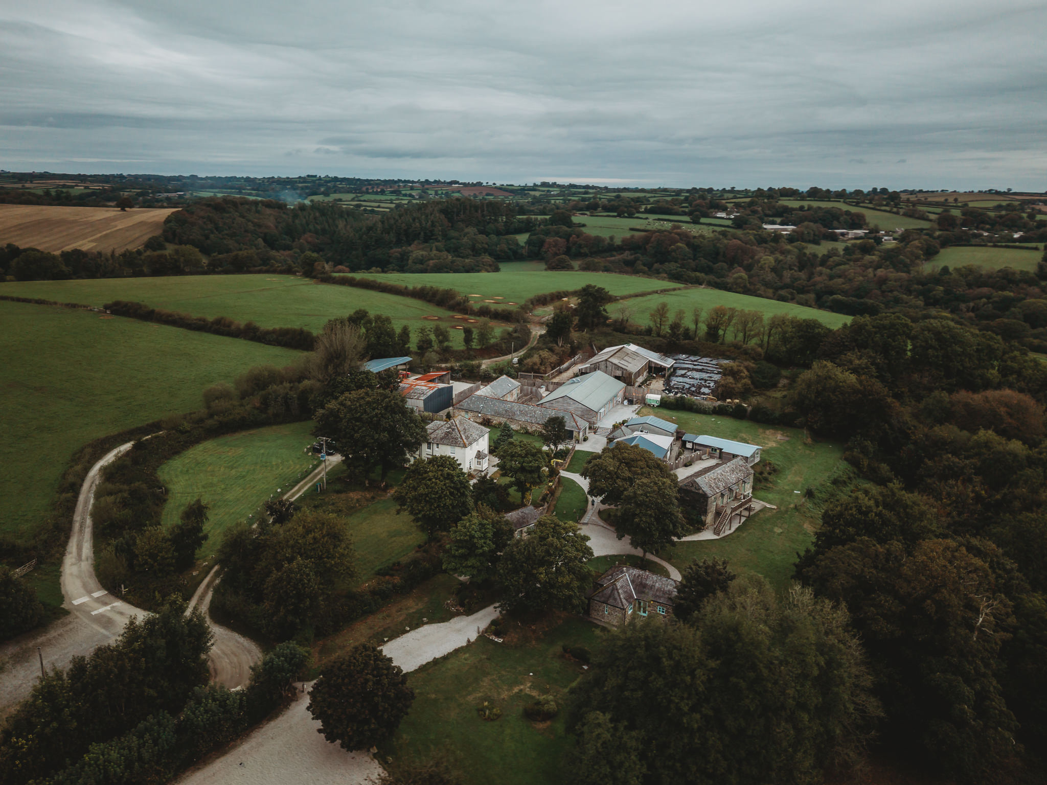 The Green Cornwall Wedding Photographer 1 The Green Cornwall seen from the air in its valley near Liskeard, by The Green Cornwall wedding photographer Matt Wing