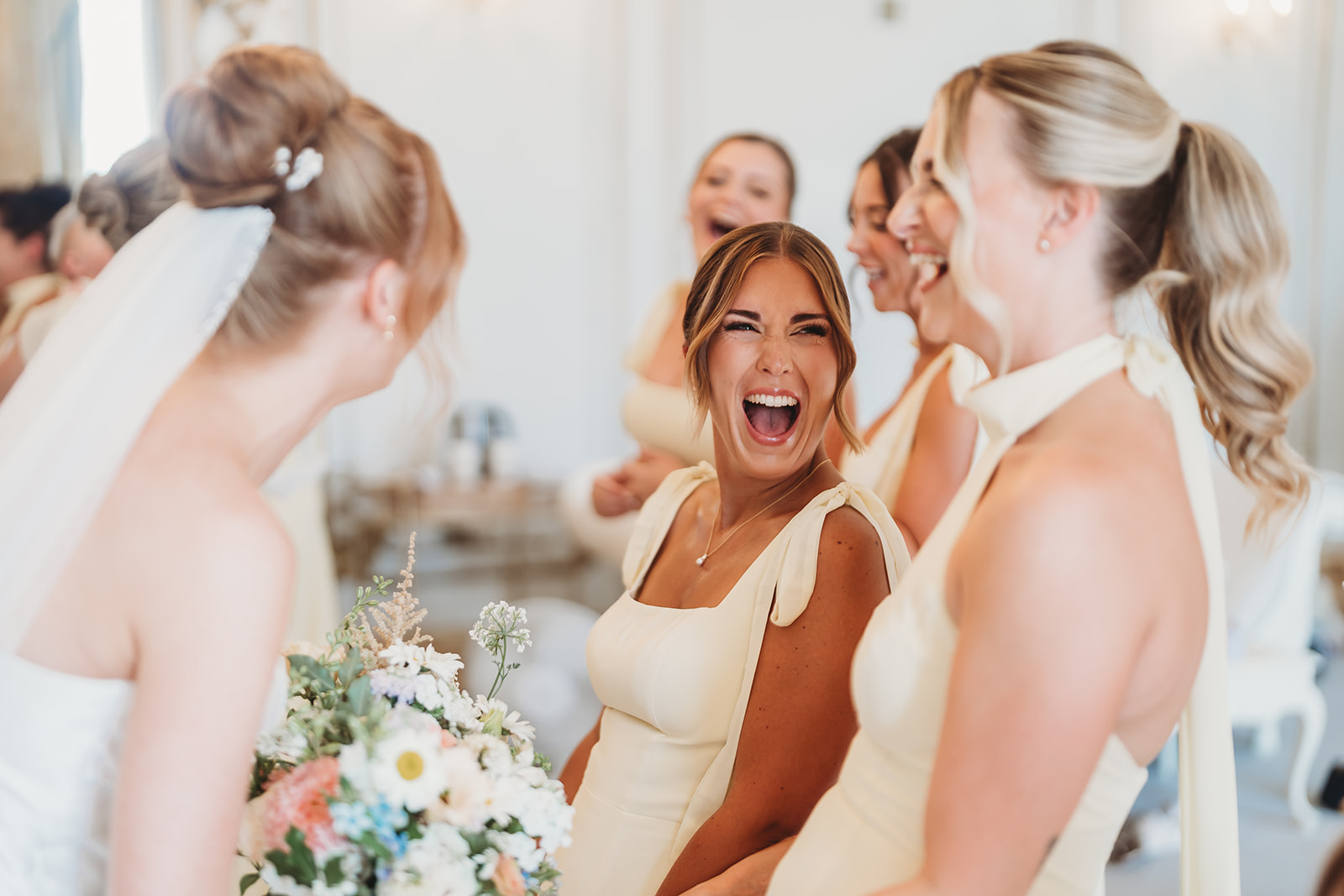 Bride ready for her Gosfield Hall wedding, with a first look from her dad