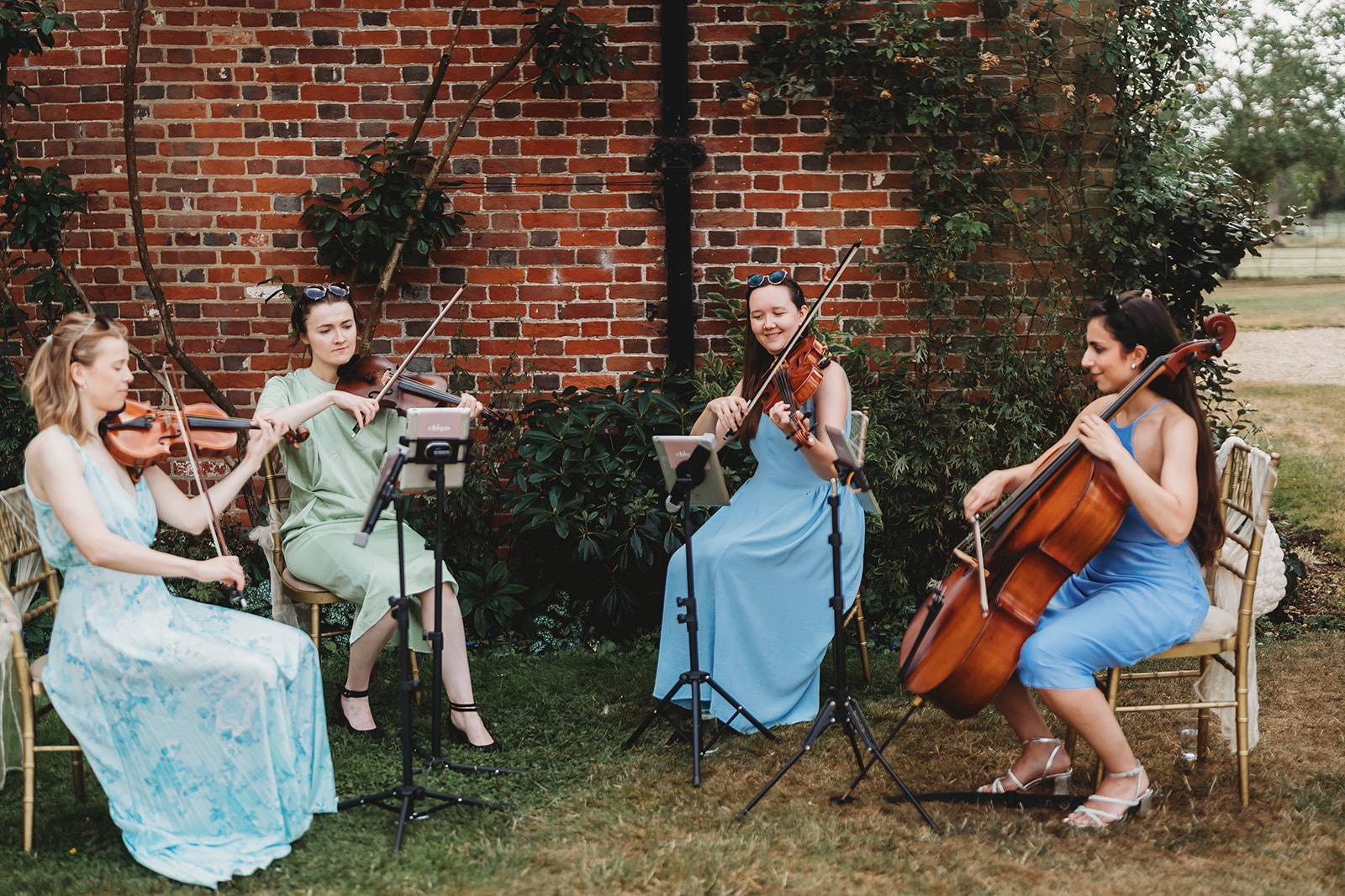 Outdoor wedding ceremony at Gosfield Hall, Essex