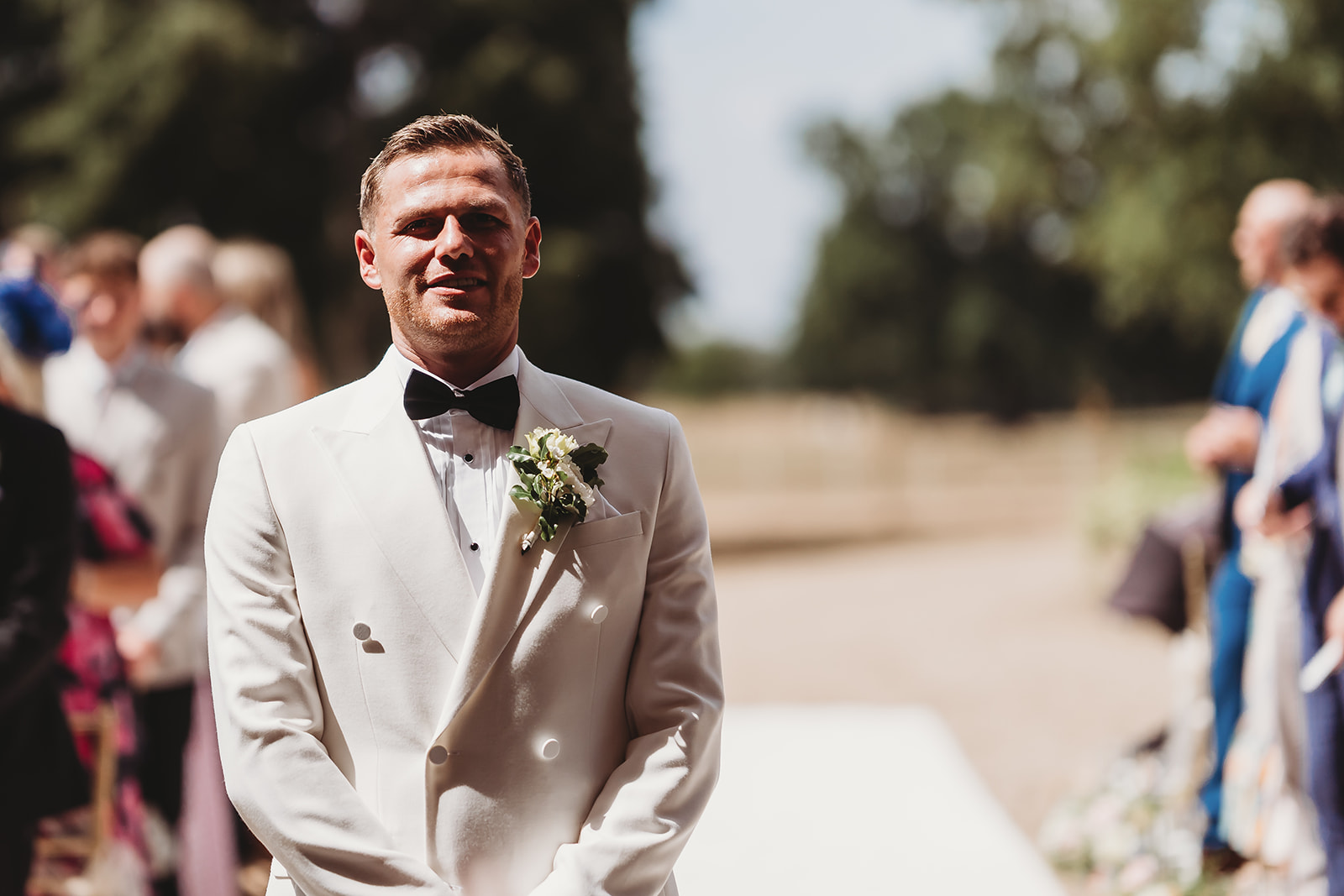 Outdoor wedding ceremony at Gosfield Hall, Essex