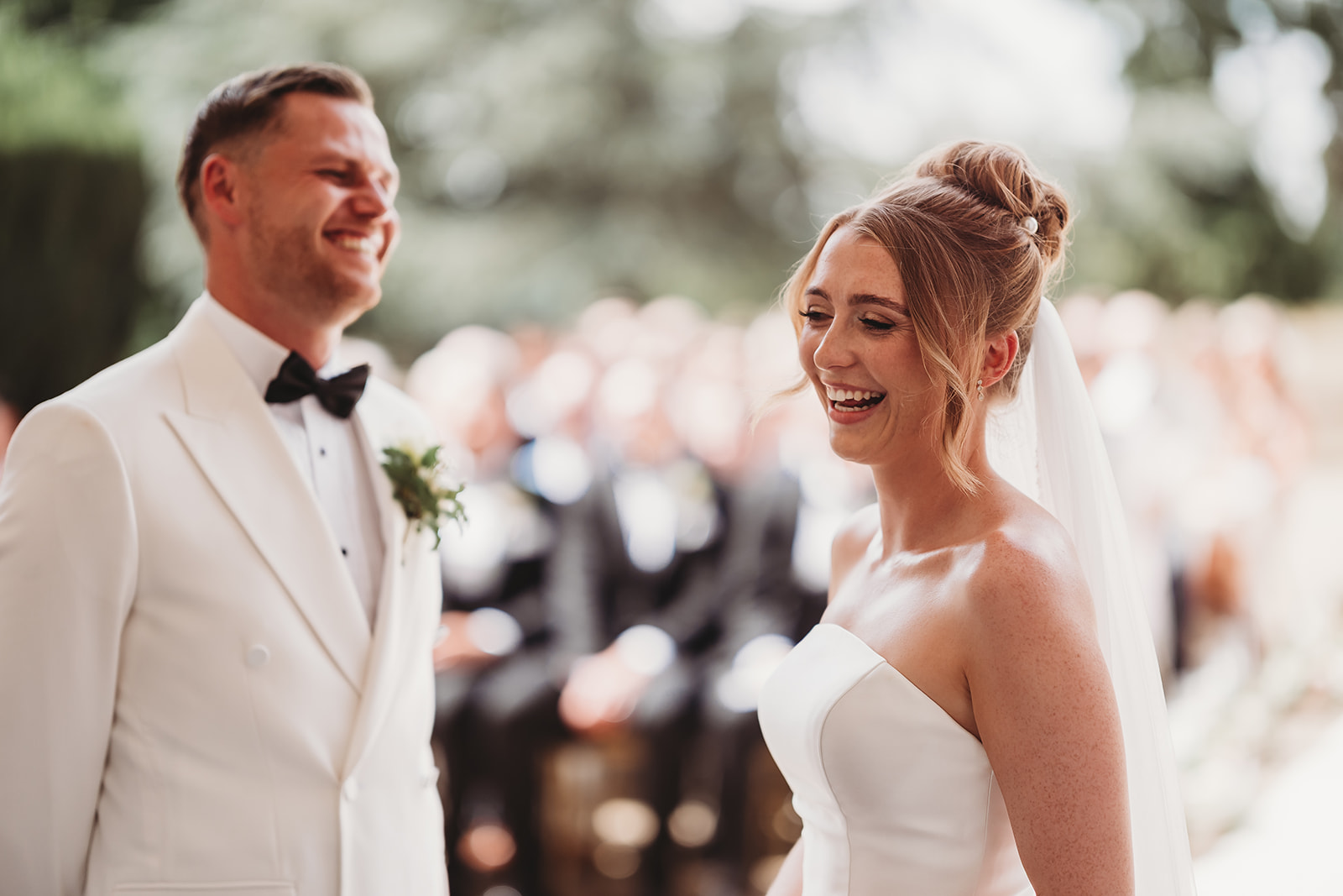 Outdoor wedding ceremony at Gosfield Hall, Essex