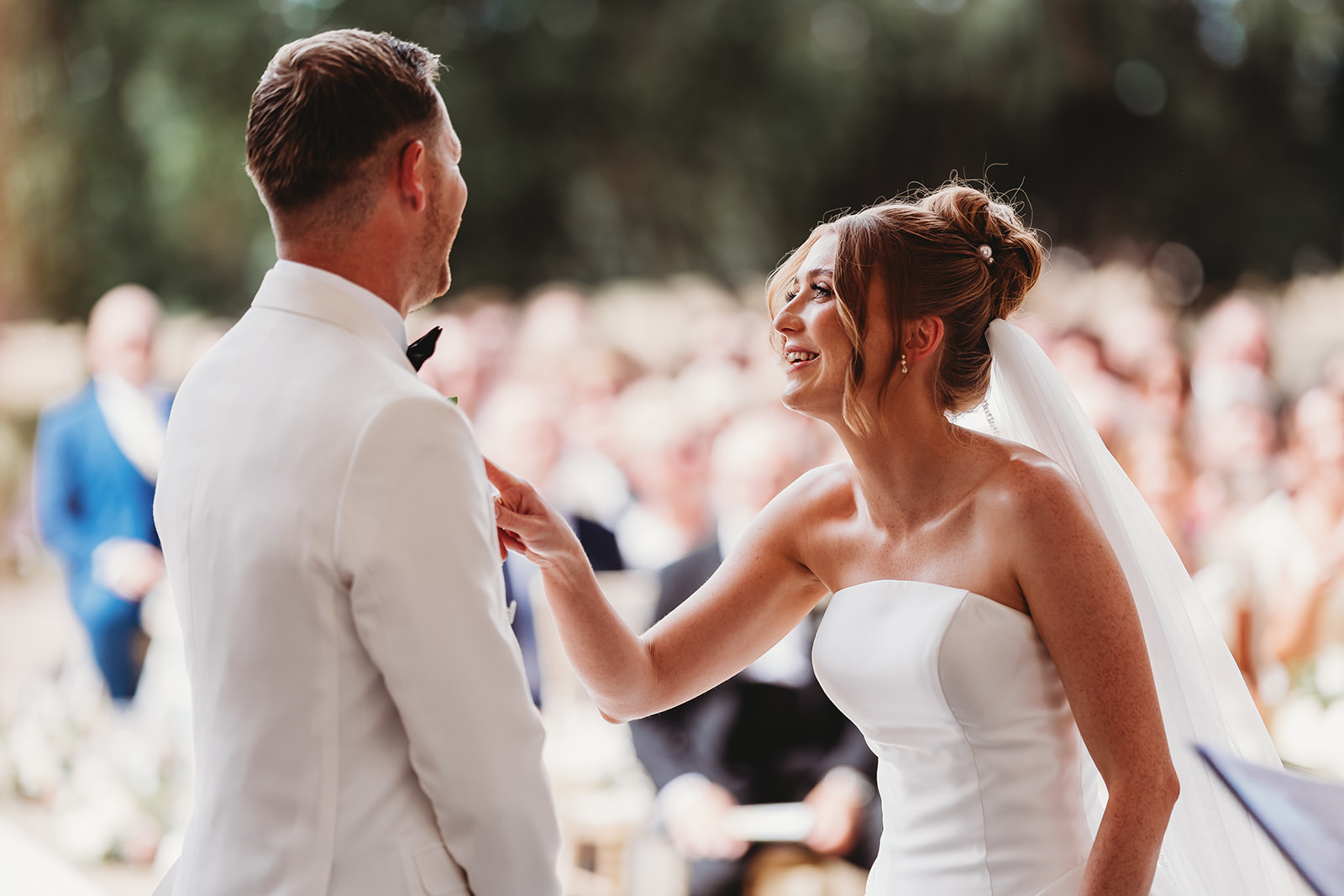 Outdoor wedding ceremony at Gosfield Hall, Essex