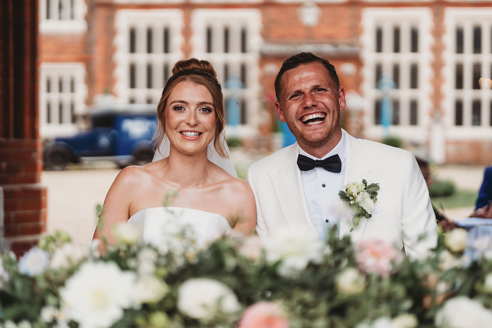 Outdoor wedding ceremony at Gosfield Hall, Essex