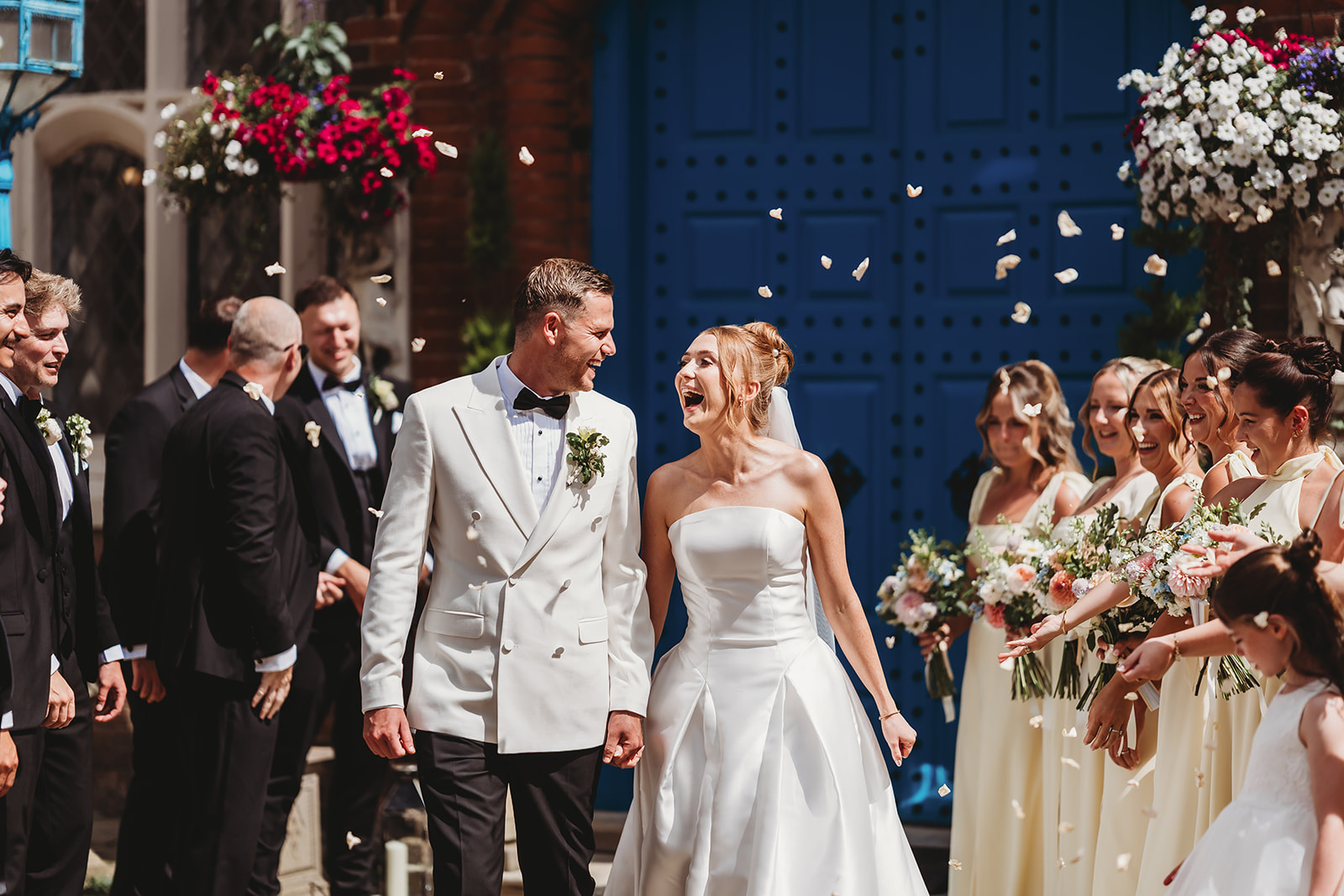 Confetti in the courtyard at a Gosfield Hall wedding