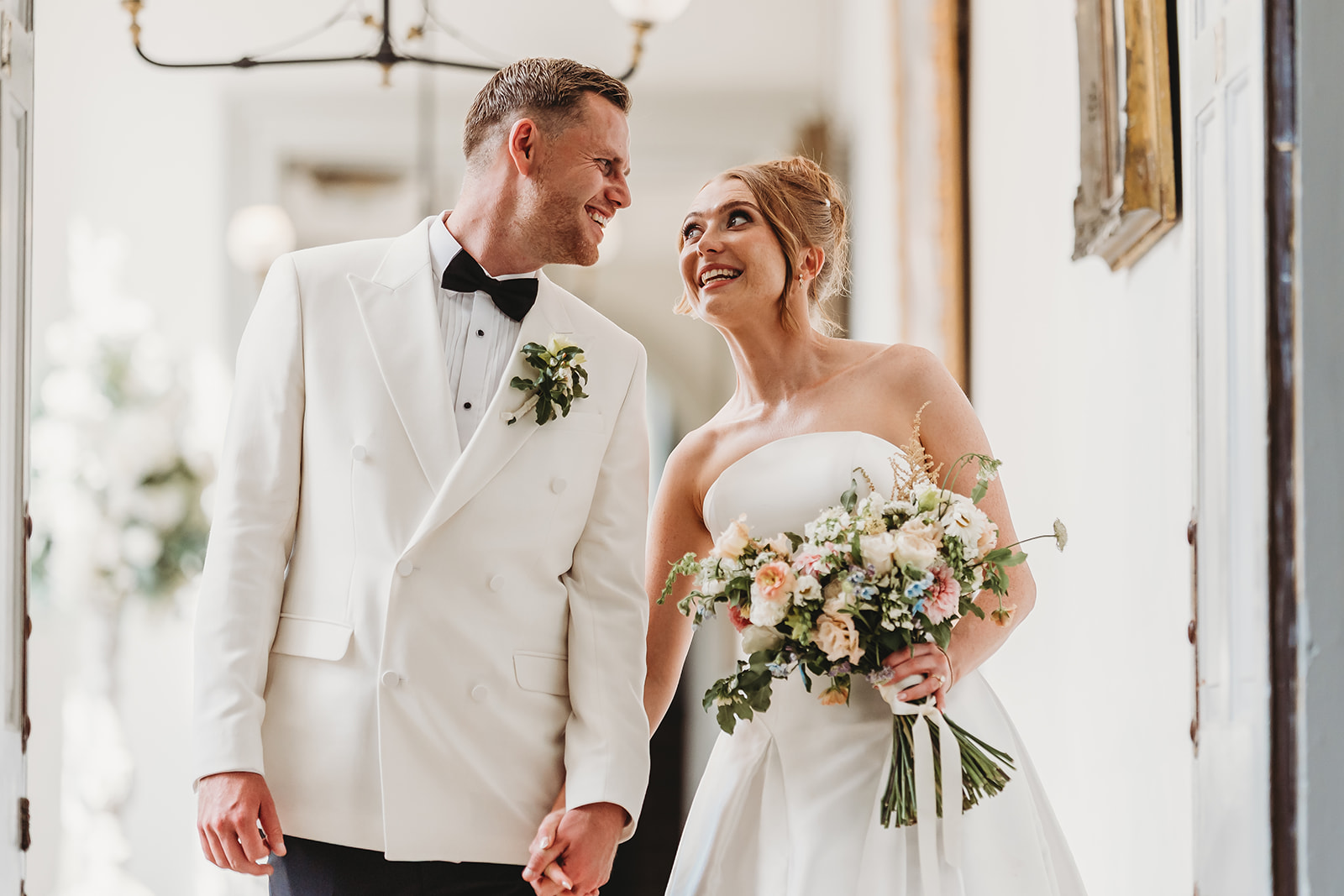 Couple portraits around Gosfield Hall in Essex