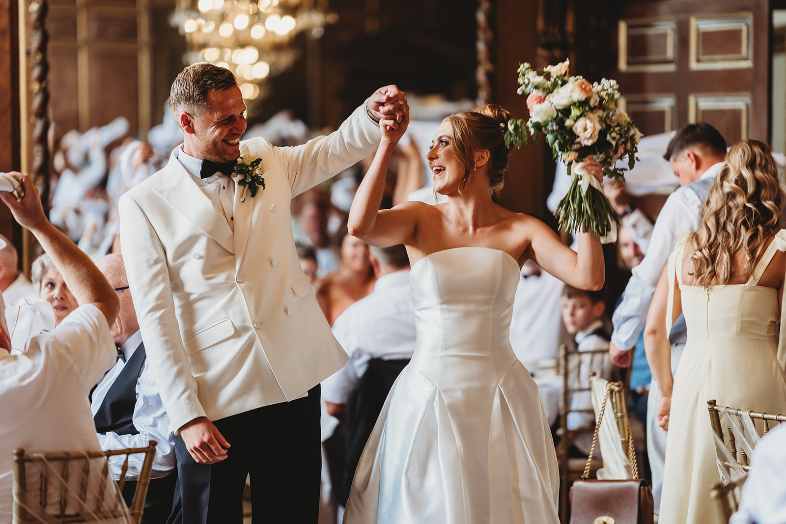 Wedding breakfast and speeches in the panelled dining room at Gosfield Hall