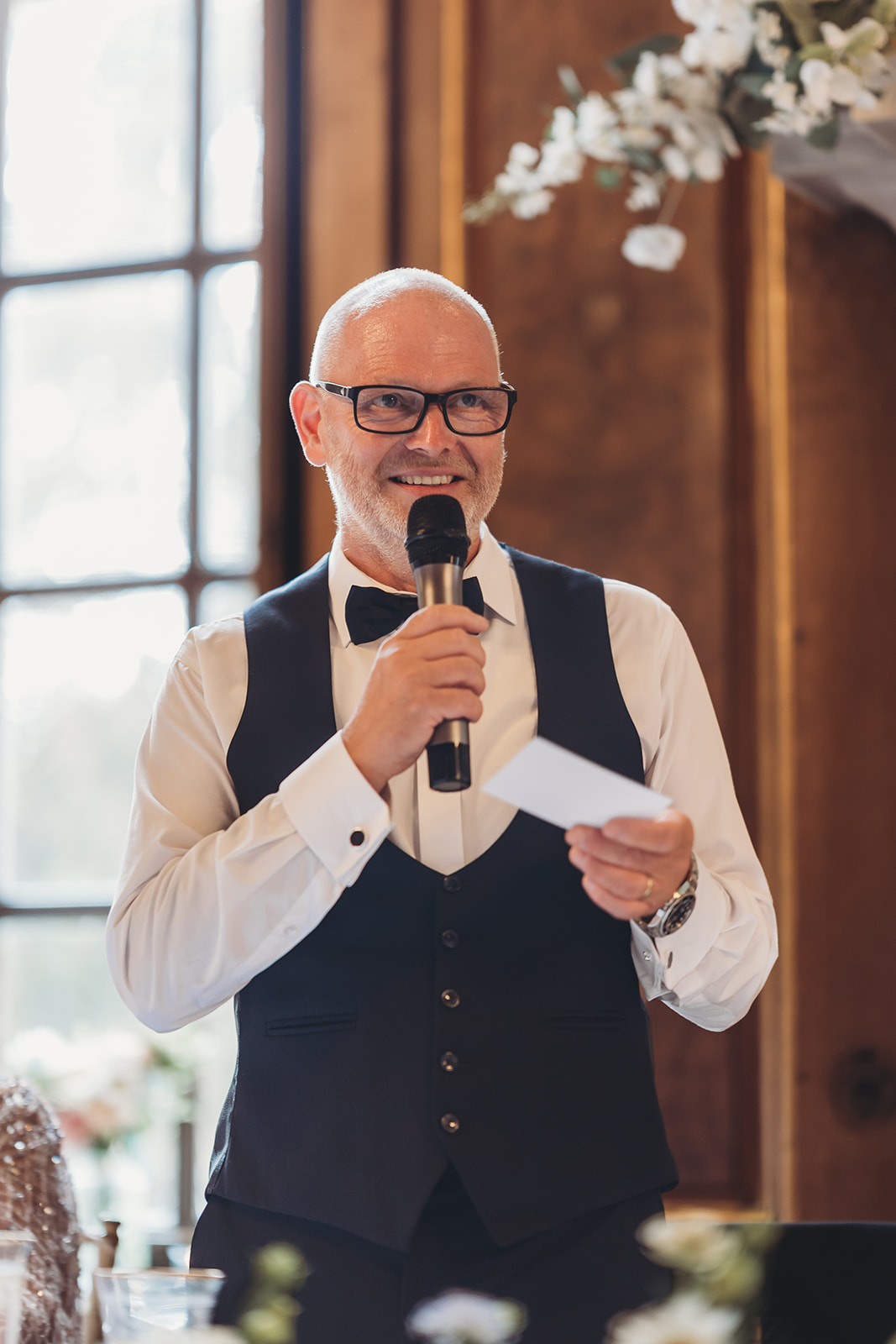 Wedding breakfast and speeches in the panelled dining room at Gosfield Hall