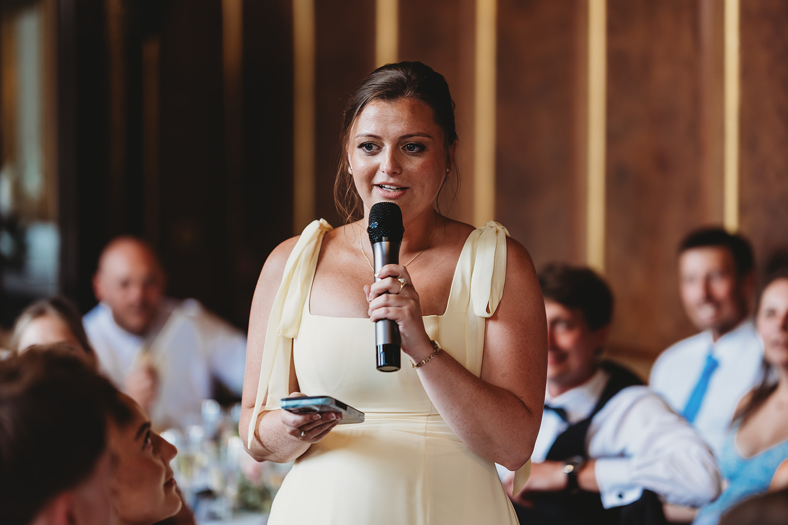 Wedding breakfast and speeches in the panelled dining room at Gosfield Hall