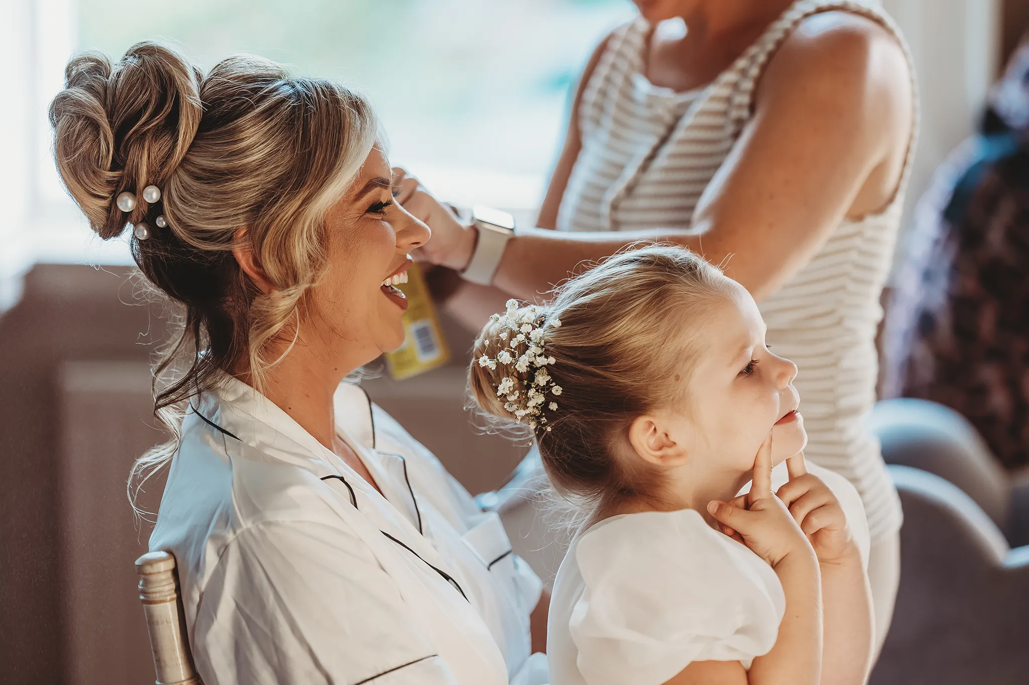 Emily & Alan / The Orangery 9 Emily laughing with her flower girl during the morning — documentary wedding photography Kent