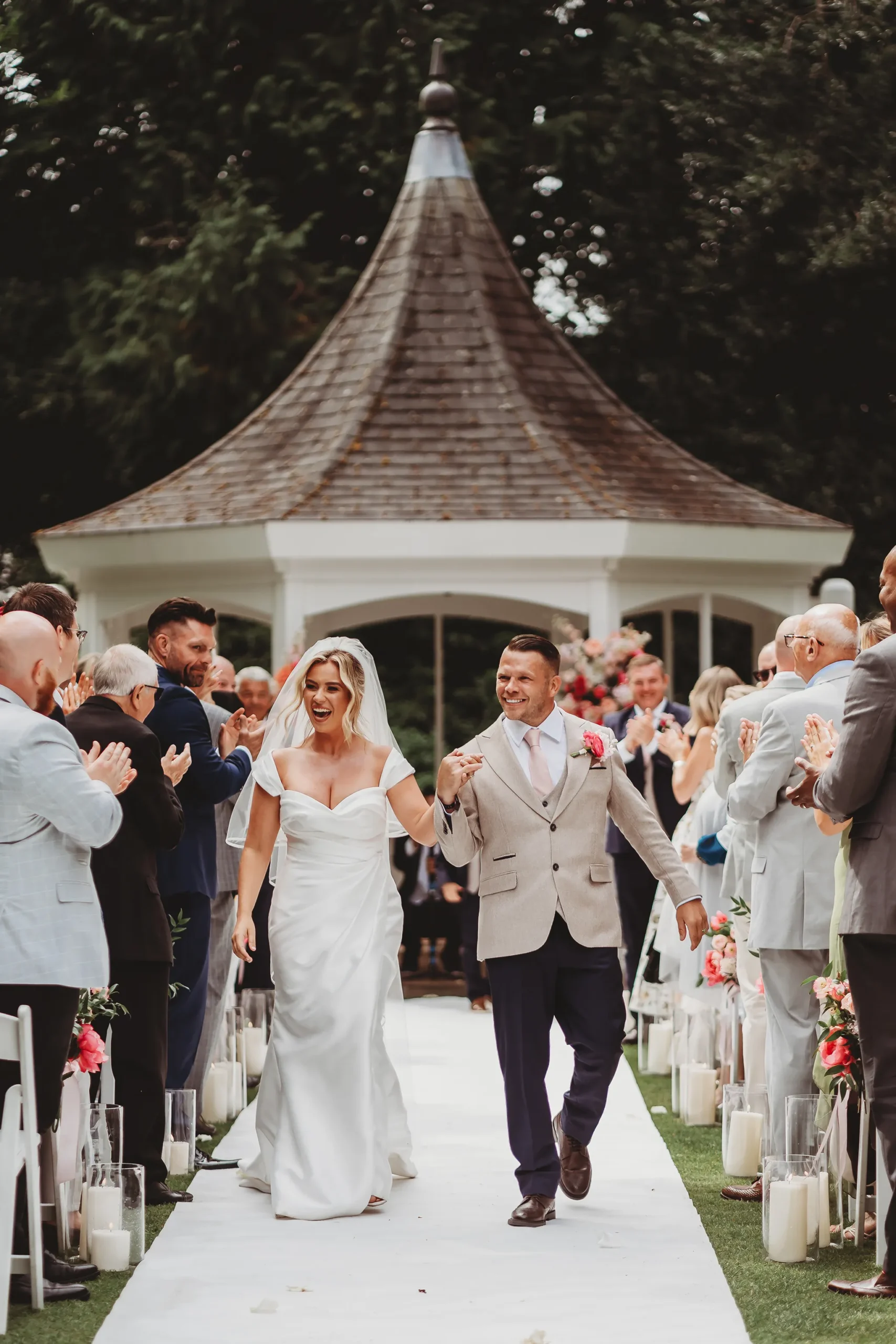 Emily & Alan / The Orangery 22 Just married — Emily and Alan leaving the gazebo ceremony