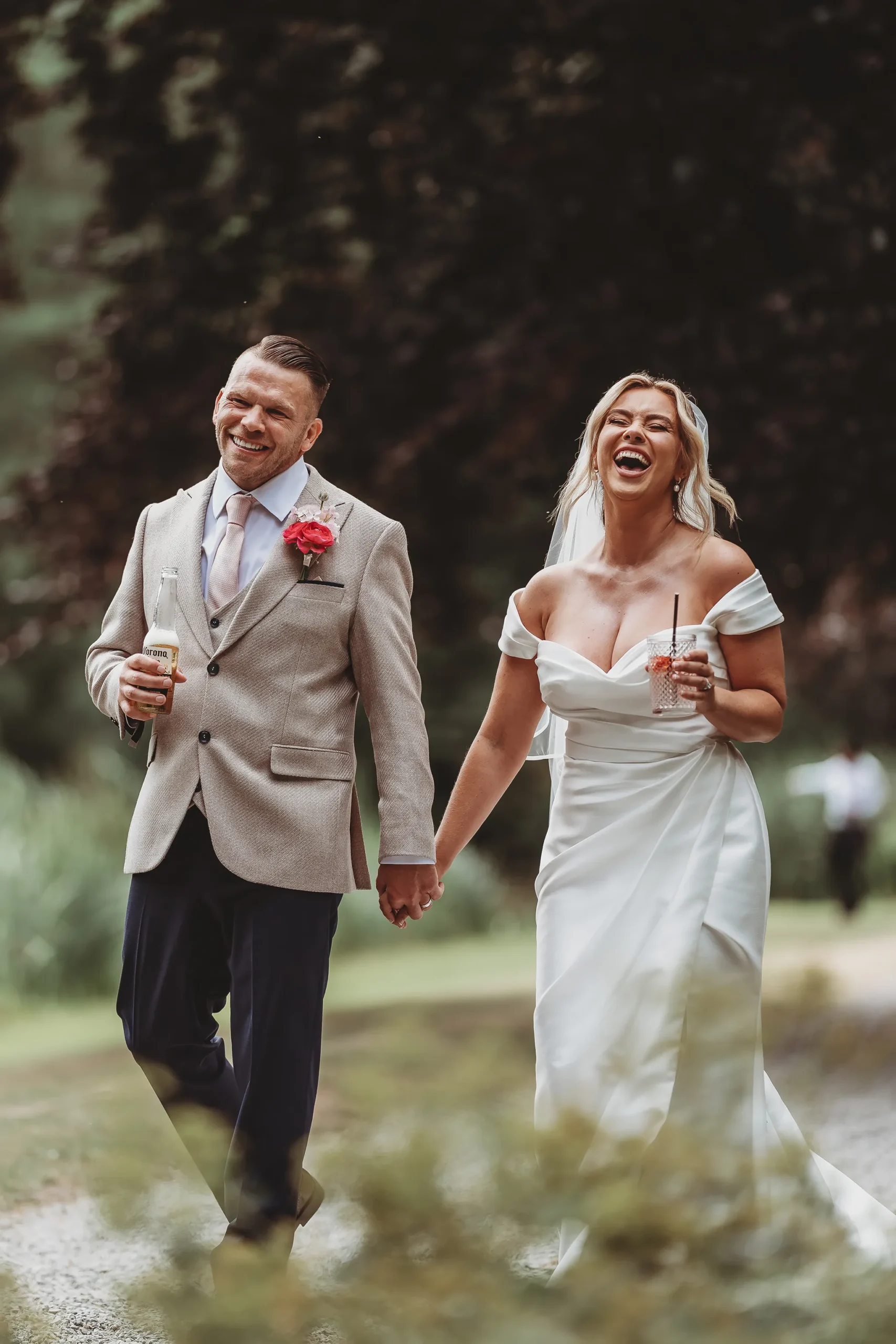 Emily & Alan / The Orangery 2 Emily and Alan laughing together after the ceremony — Orangery Maidstone wedding photography