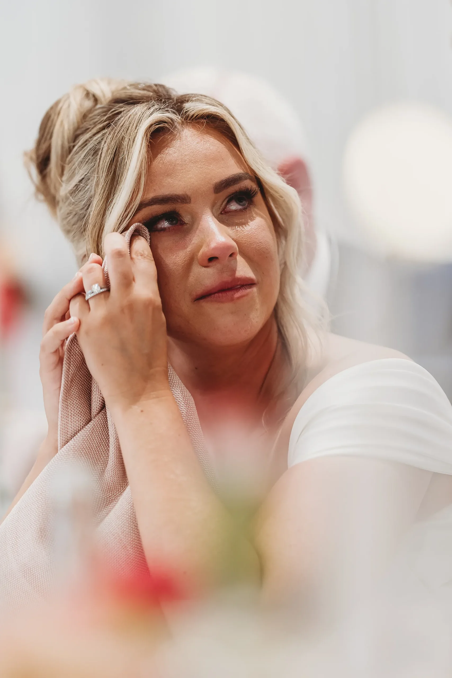 Emily & Alan / The Orangery 37 Emily wiping away a tear during Alan’s speech — documentary wedding photography