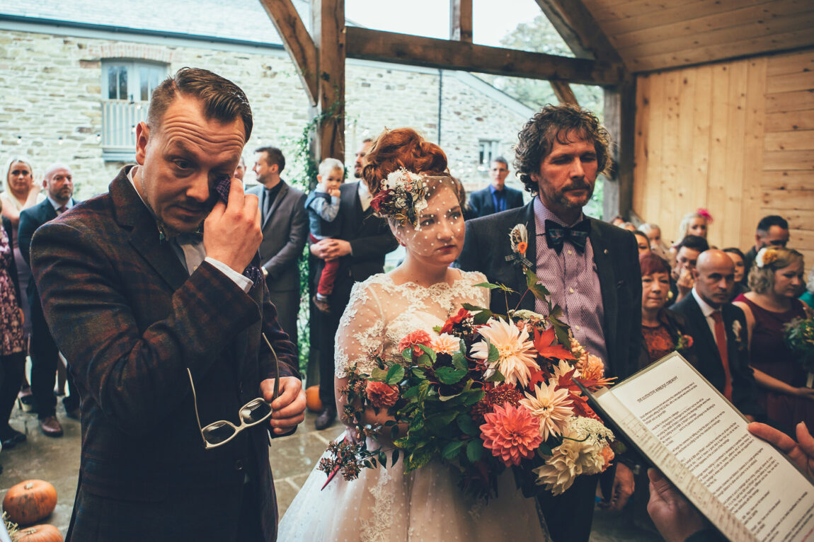 Couple laughing during their ceremony at Nancarrow Farm
