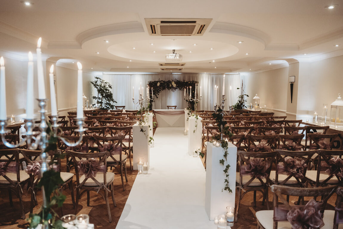 Ceremony room set up for a wedding at Oakley Court