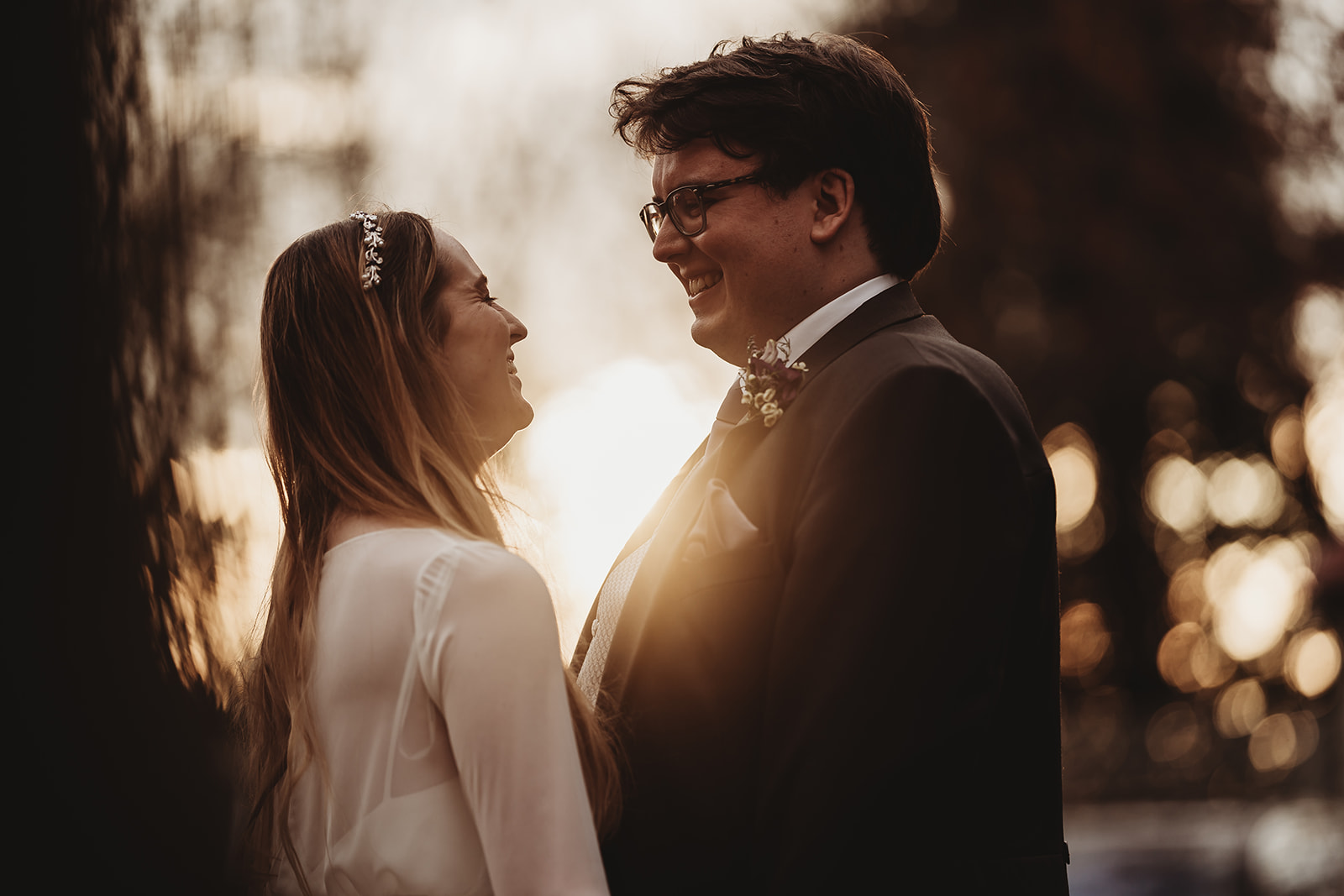 Grantley Hall wedding photographer Matt Wing, a photo from another wedding: couple laughing together at golden hour