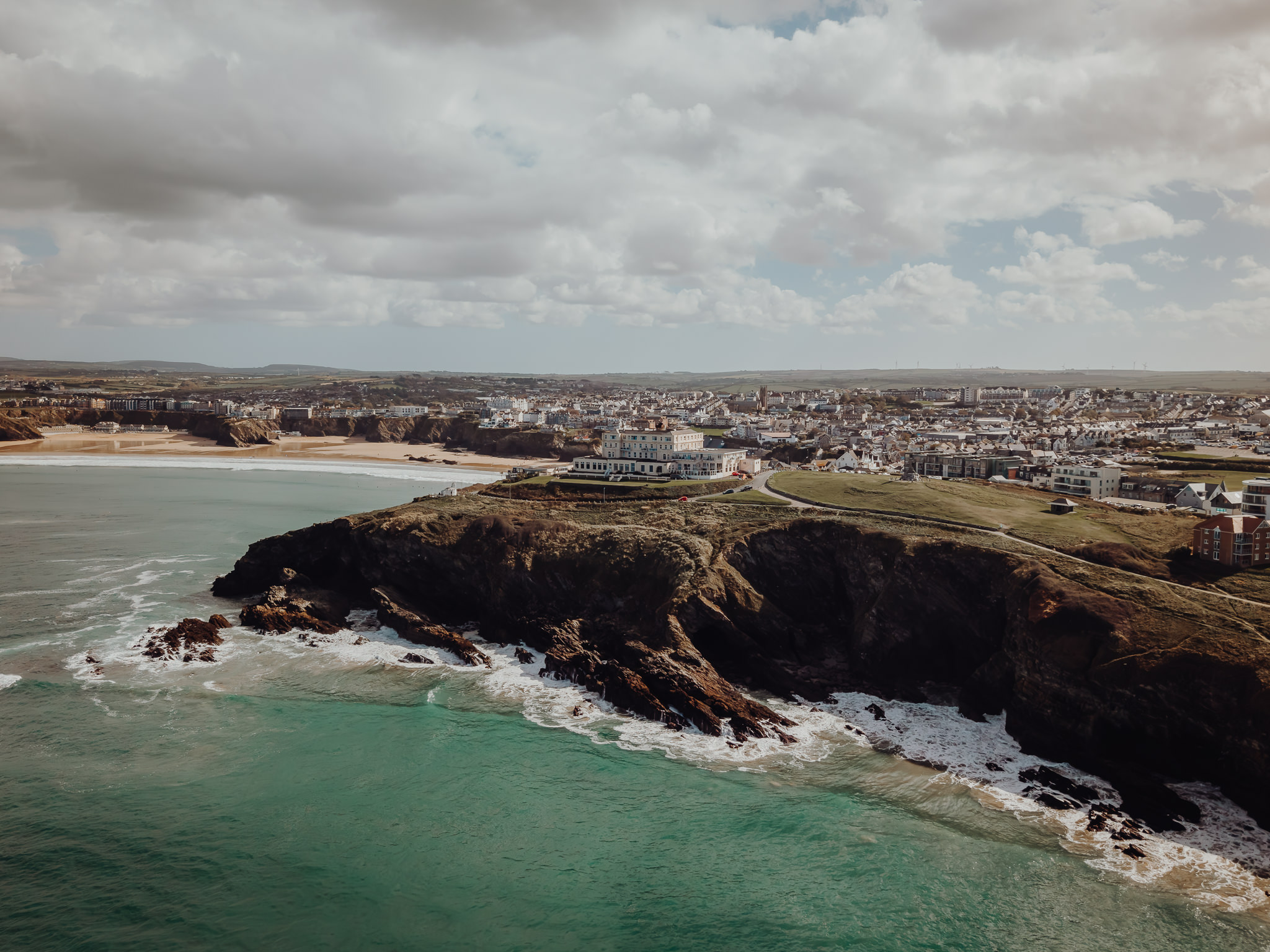 Towan Head and the Atlantic coast below the Atlantic Hotel, Newquay, from the air