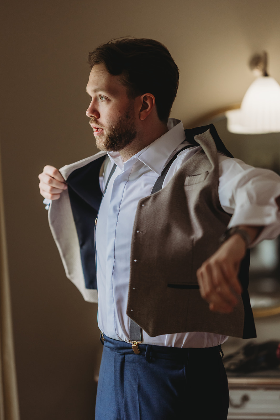 Groom getting ready for a Braxted Park wedding in Essex