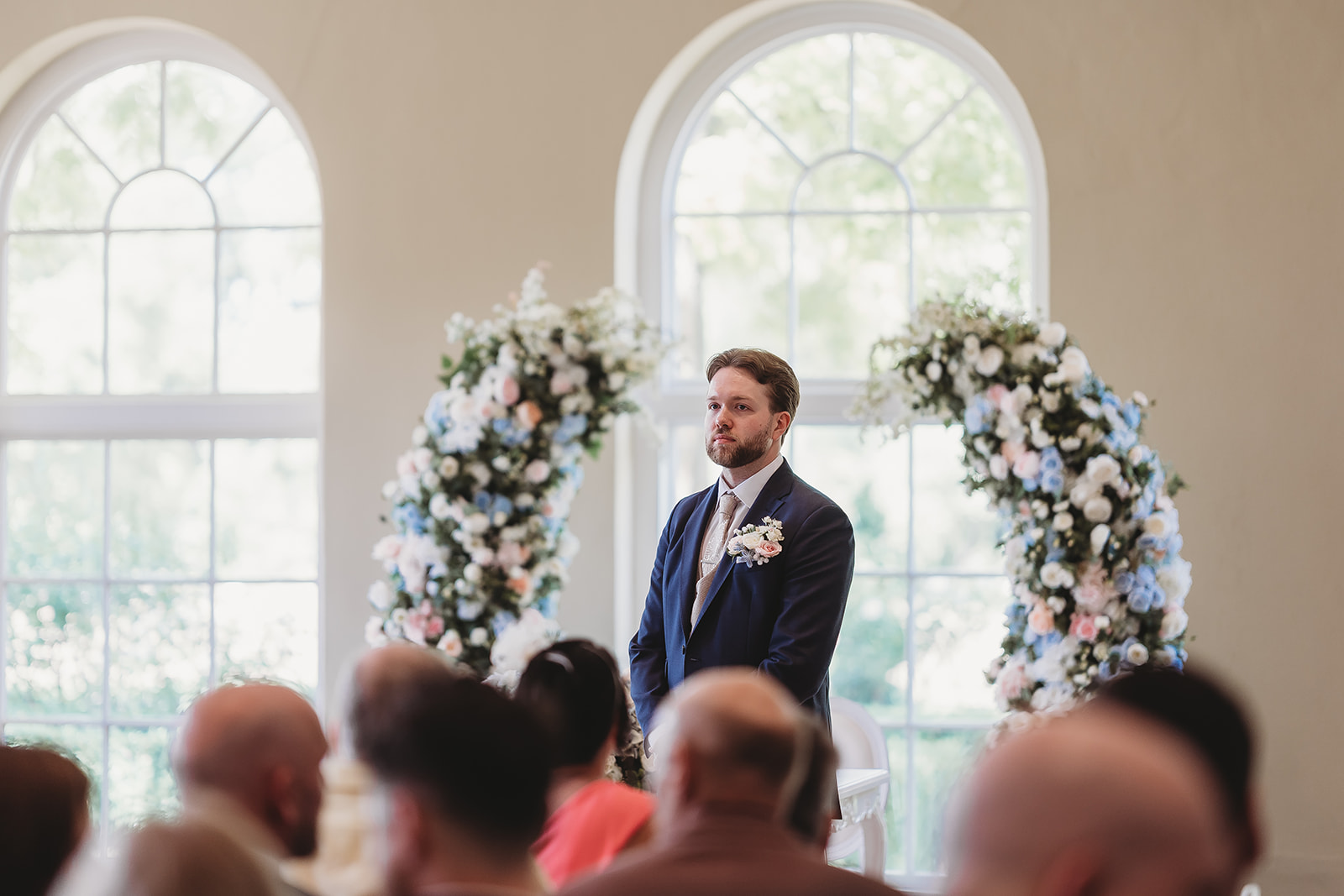 Wedding ceremony in the orangery at Braxted Park, Essex