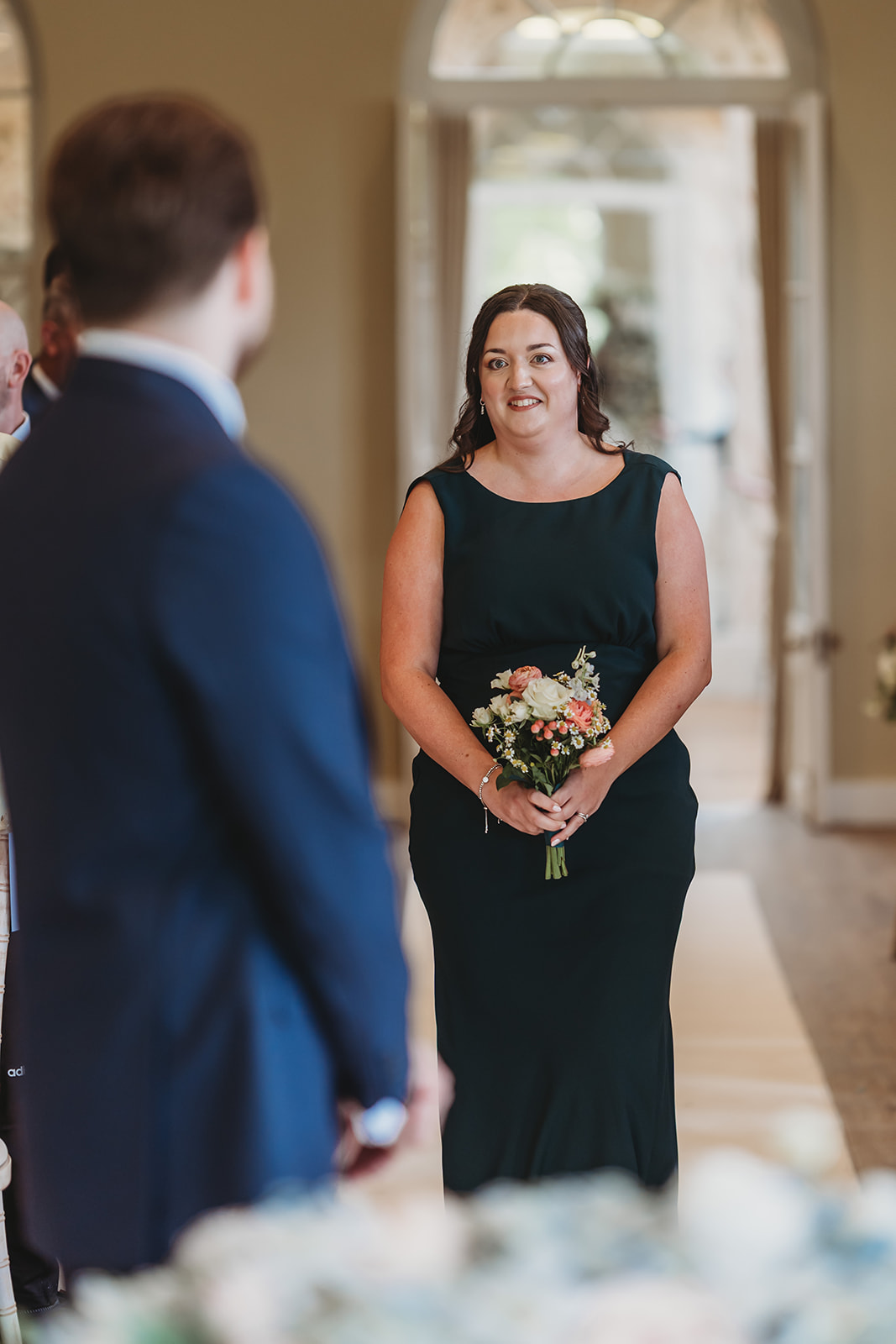 Wedding ceremony in the orangery at Braxted Park, Essex