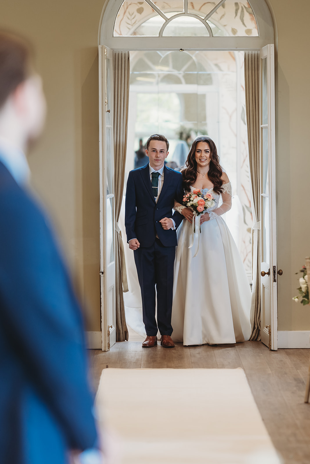 Wedding ceremony in the orangery at Braxted Park, Essex