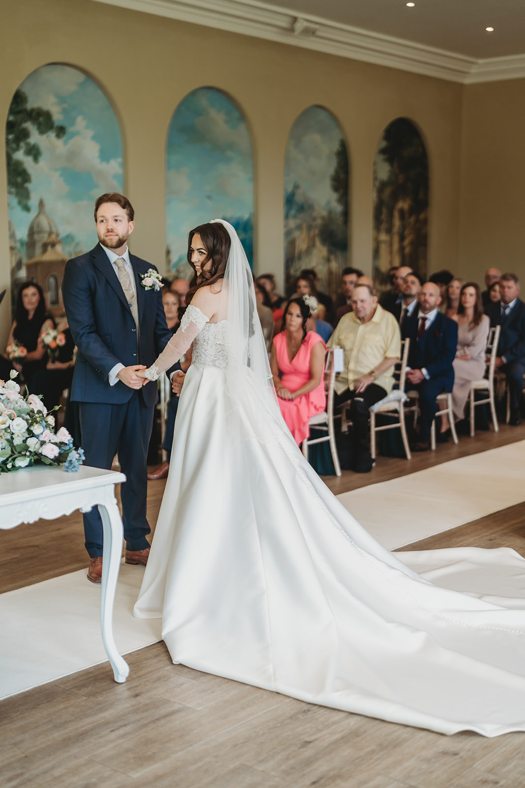 Wedding ceremony in the orangery at Braxted Park, Essex