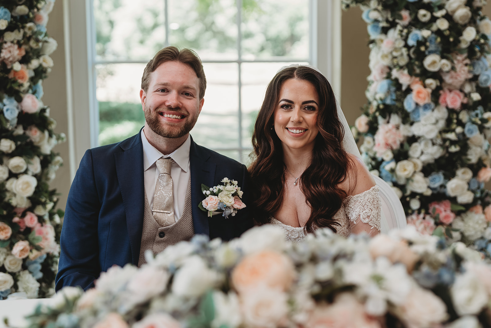 Wedding ceremony in the orangery at Braxted Park, Essex