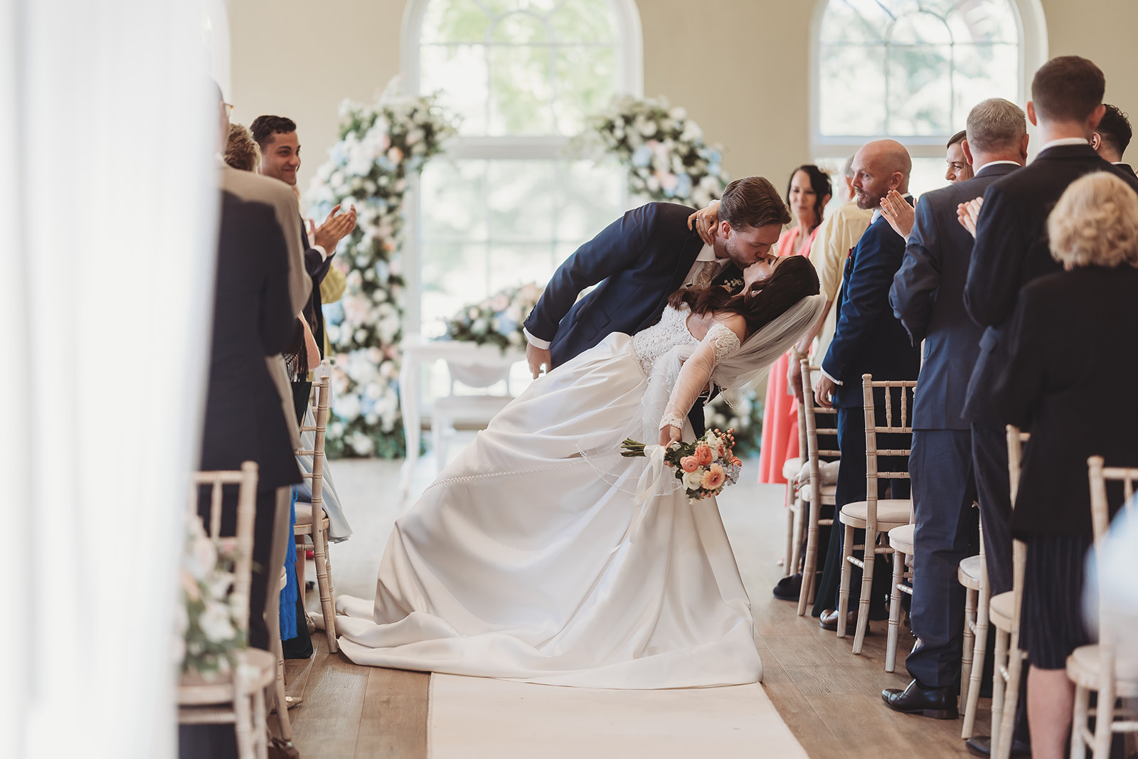Wedding ceremony in the orangery at Braxted Park, Essex