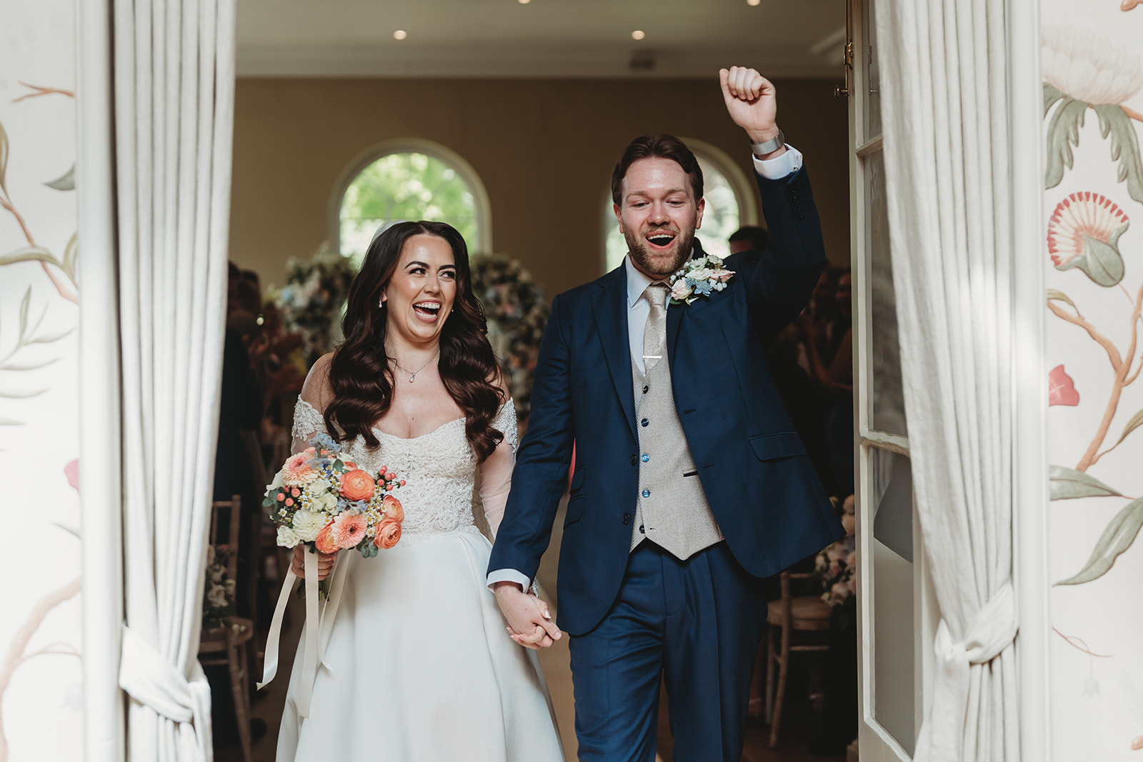 Wedding ceremony in the orangery at Braxted Park, Essex