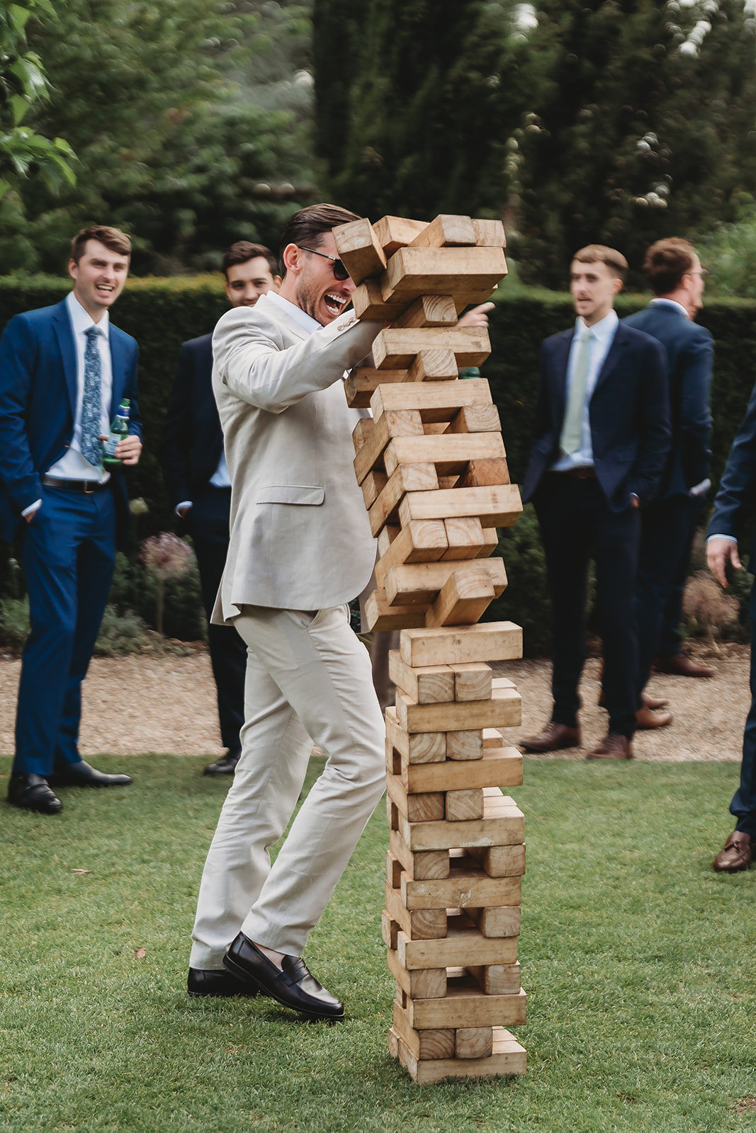 Drinks reception in the walled garden at a Braxted Park wedding